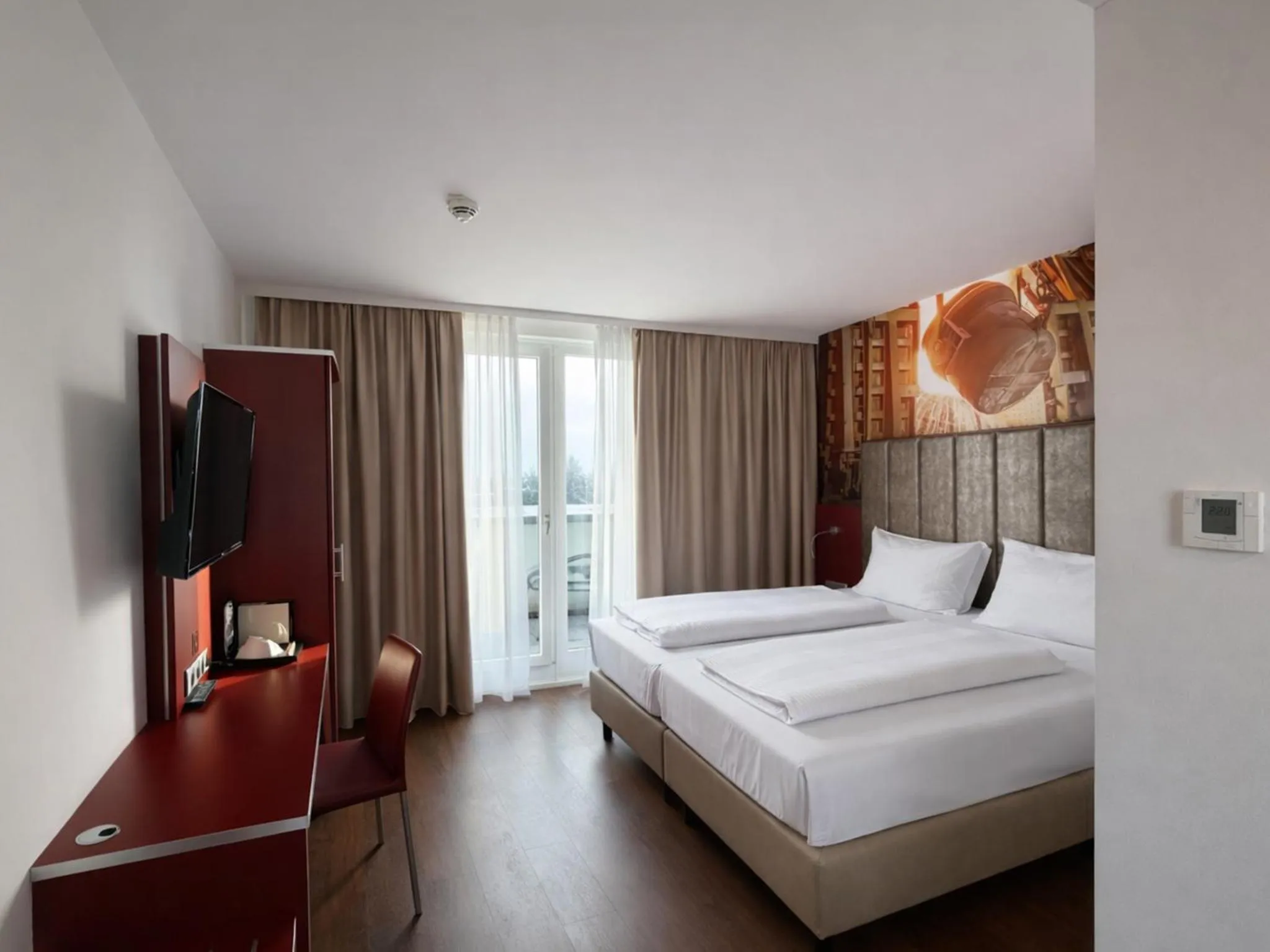 Photo of the whole room, Bed in DORMERO DeHo Linz