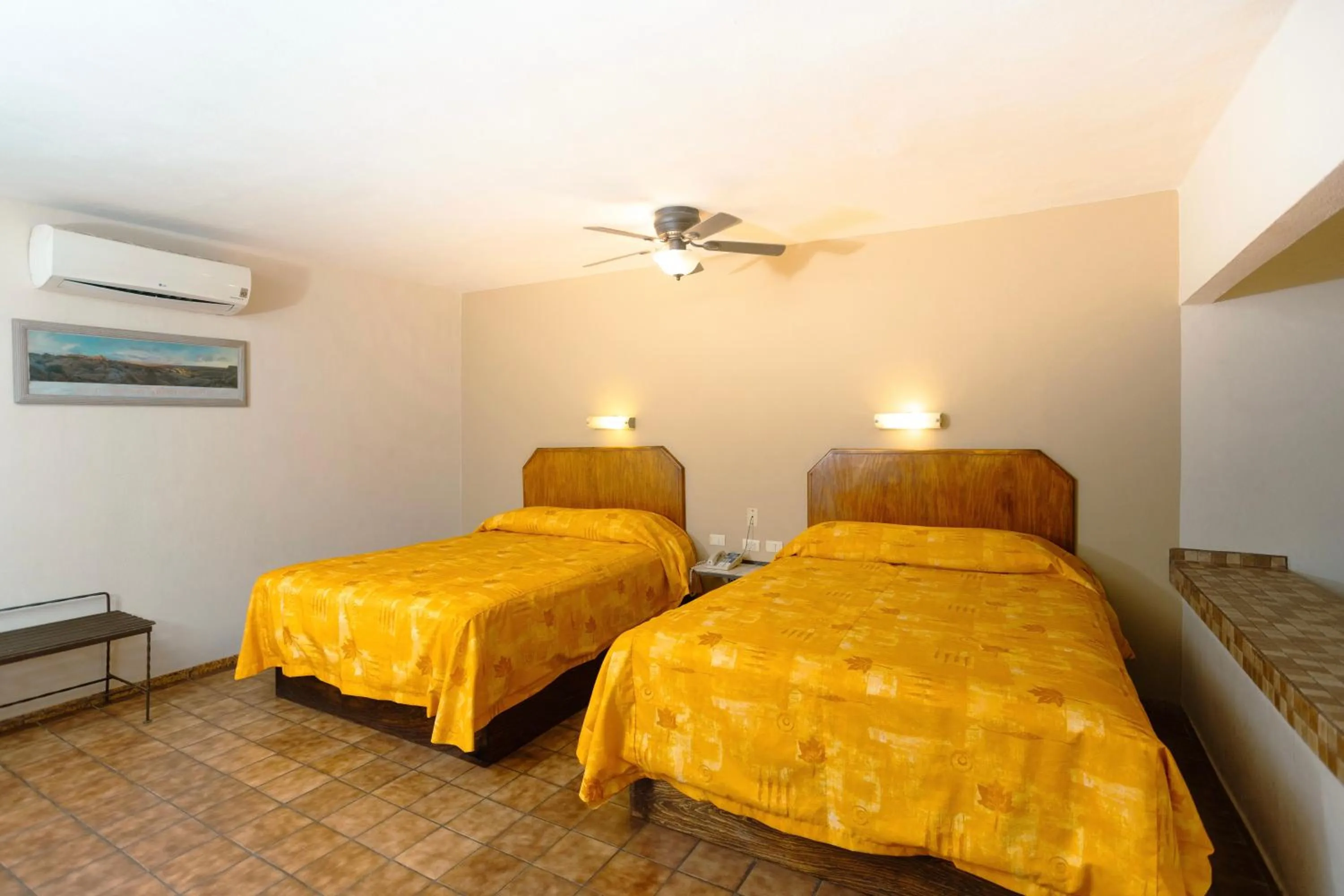 Bed in Hotel Suites Kino