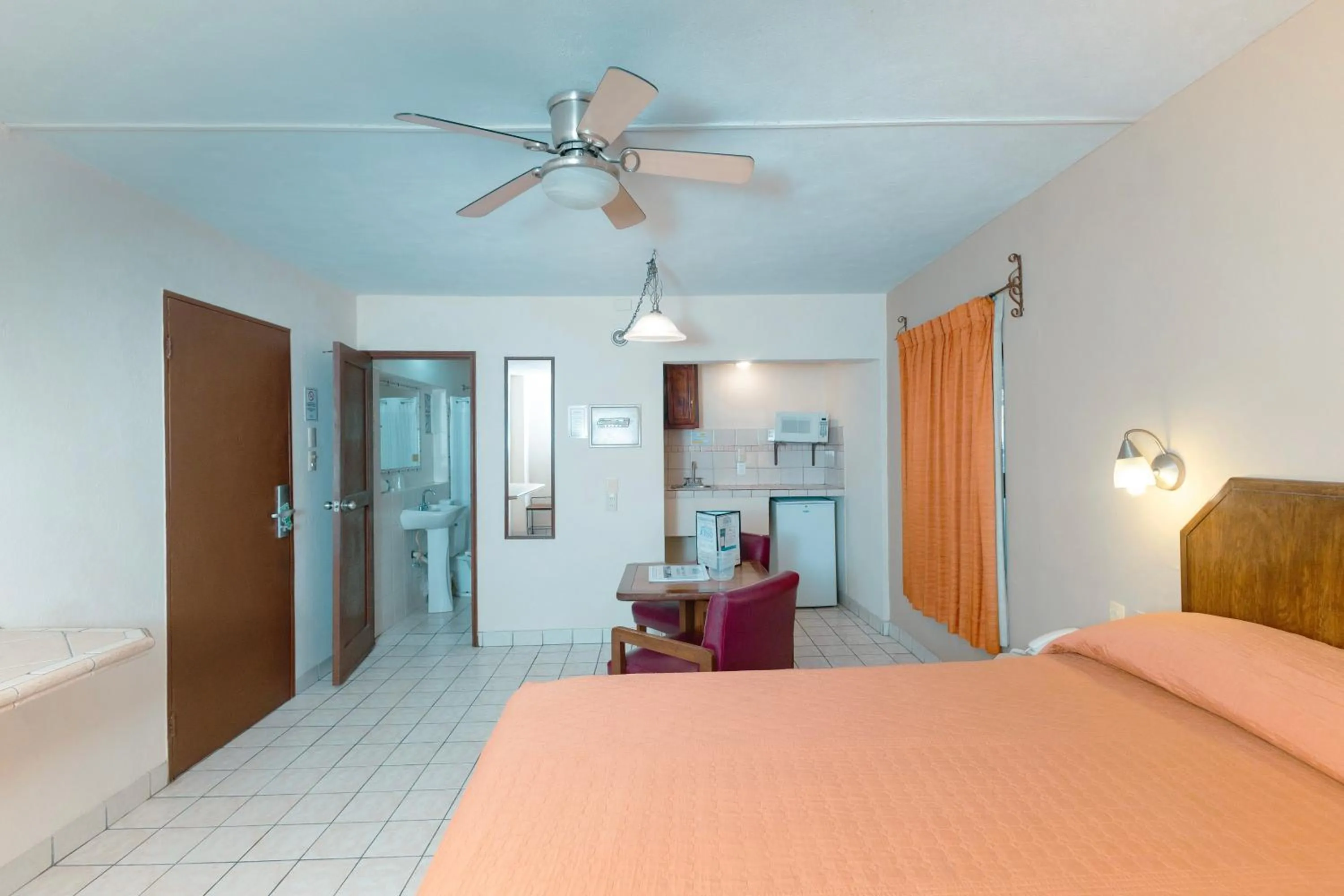 Bed in Hotel Suites Kino