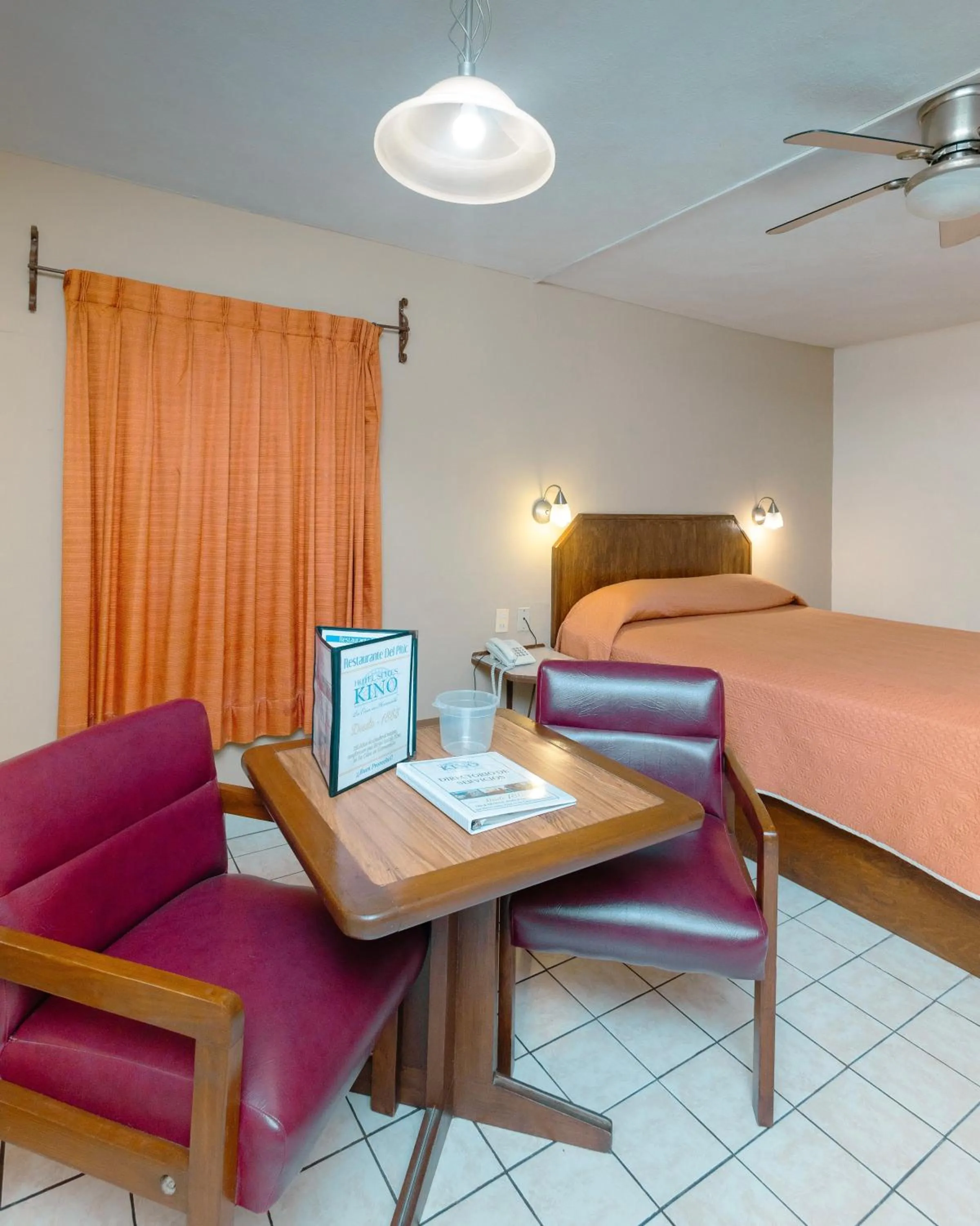 Bed in Hotel Suites Kino