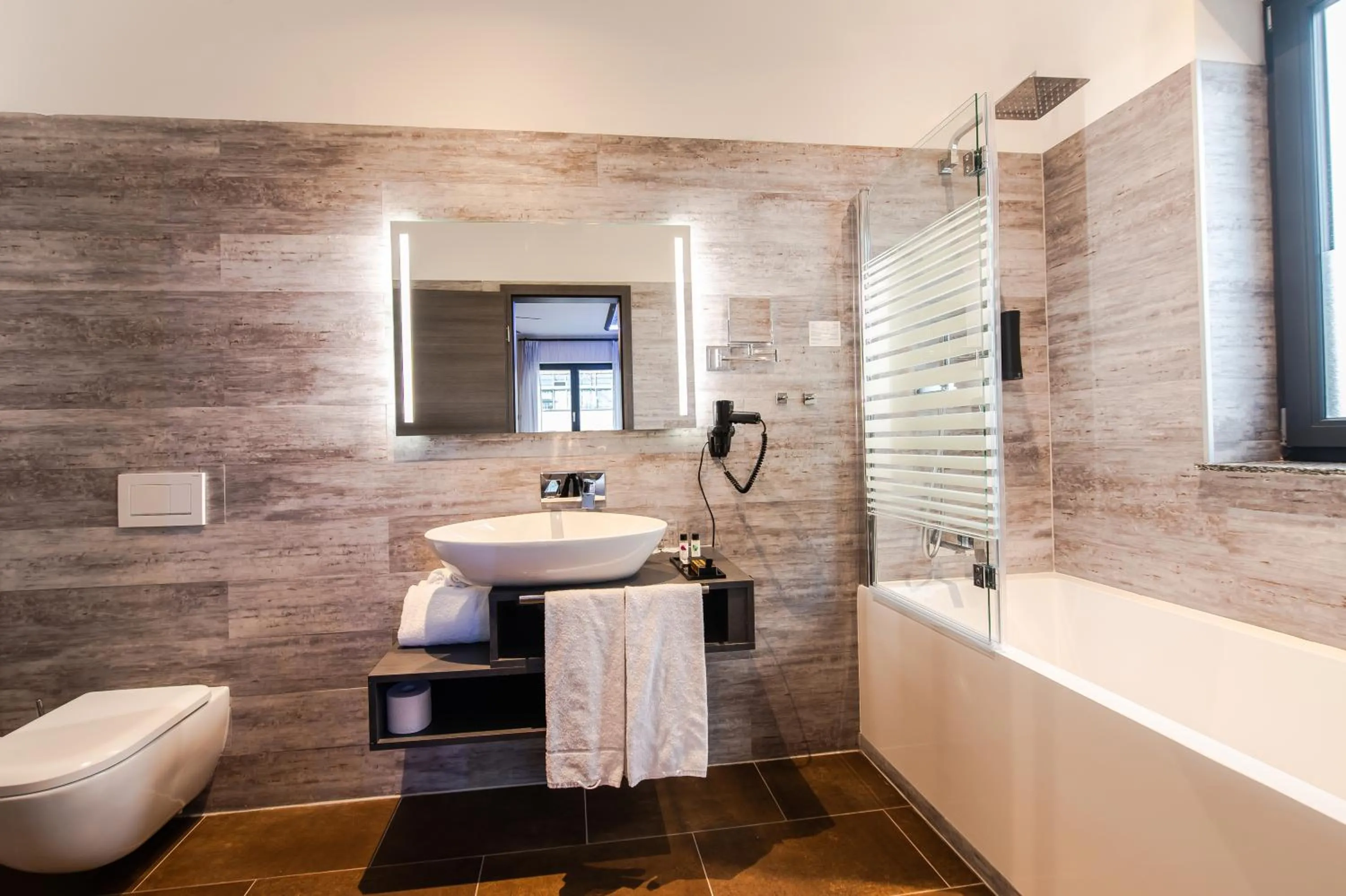 Bathroom in premium by GS Hotel