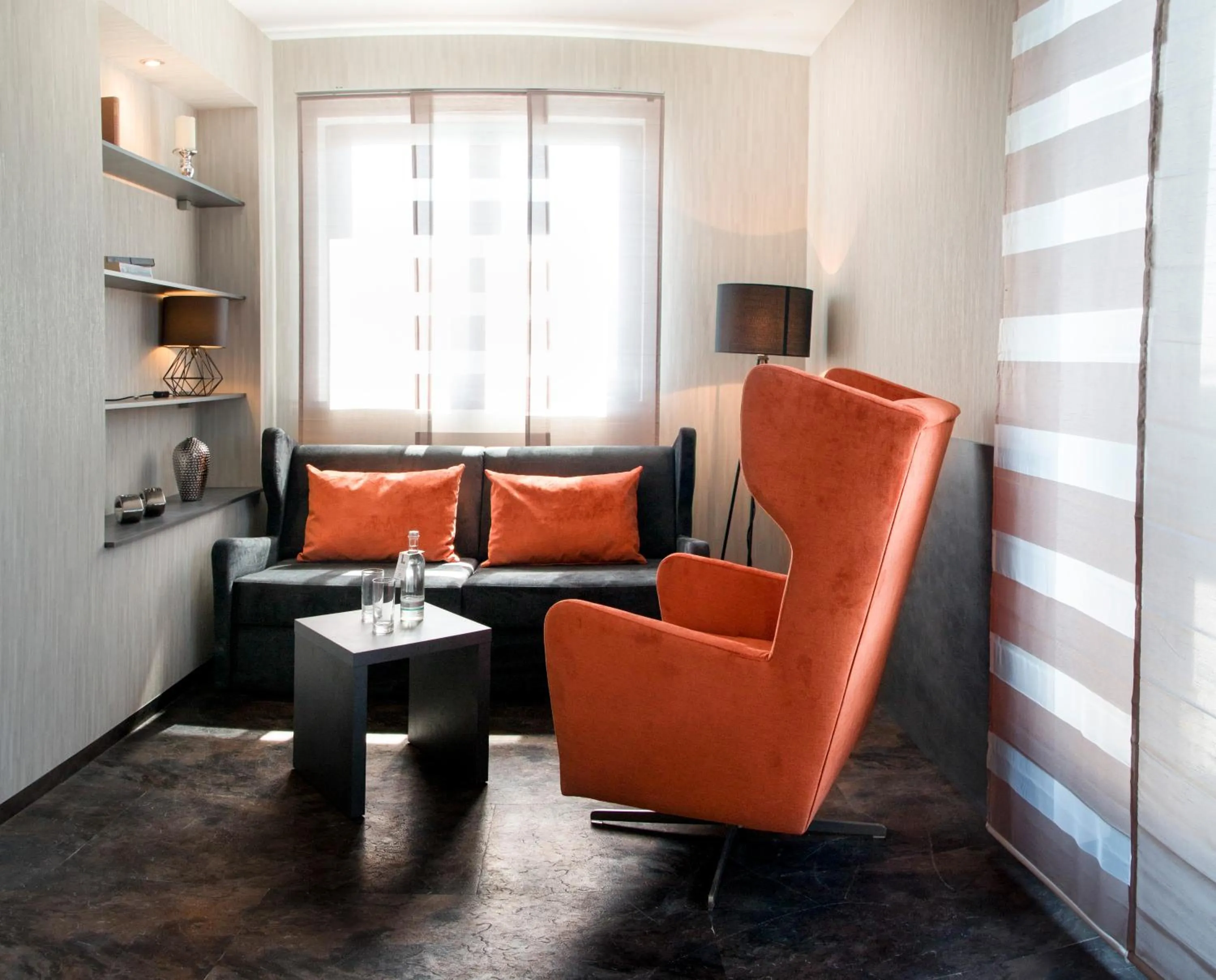 Living room in premium by GS Hotel