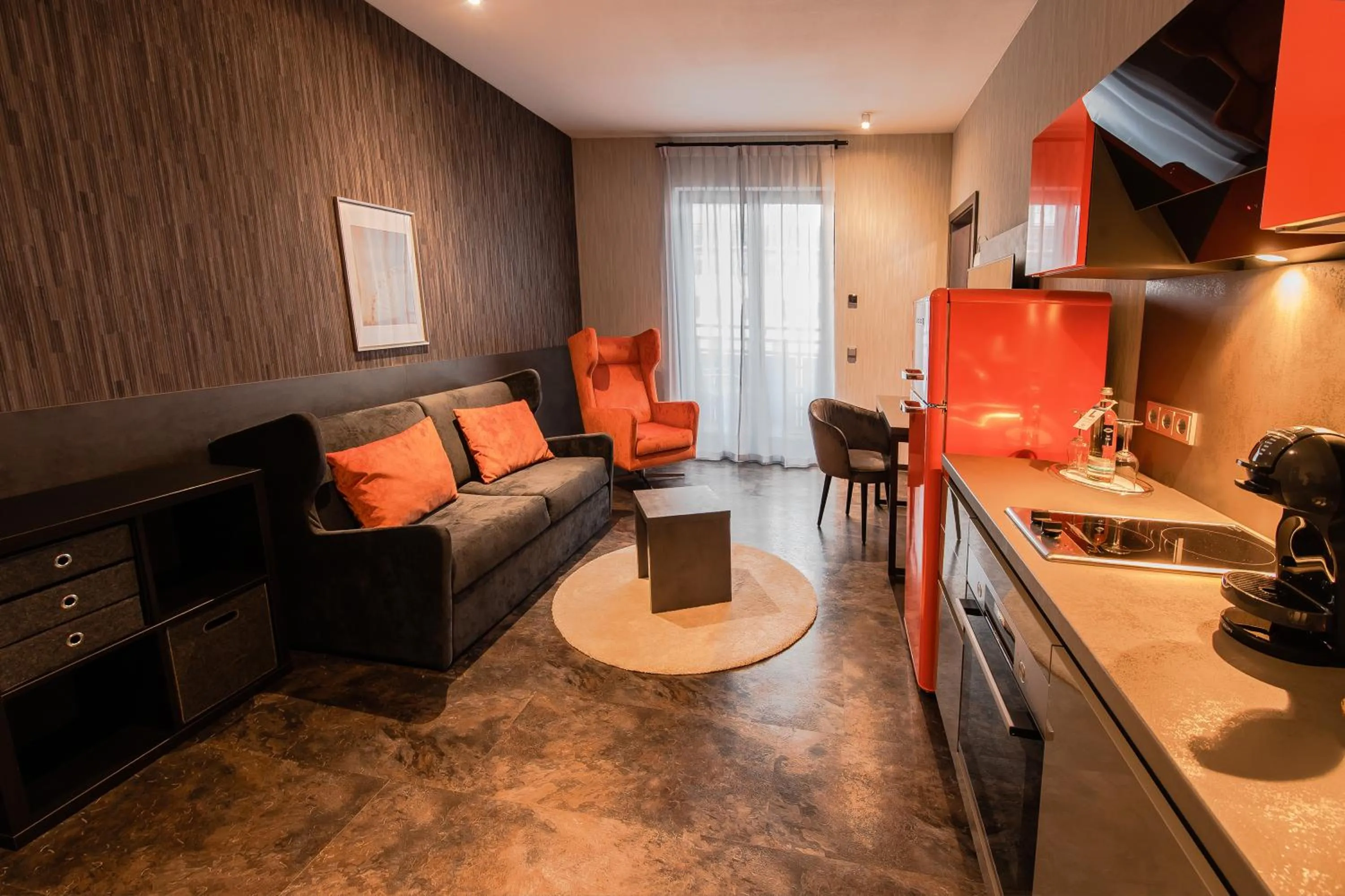 Living room in premium by GS Hotel