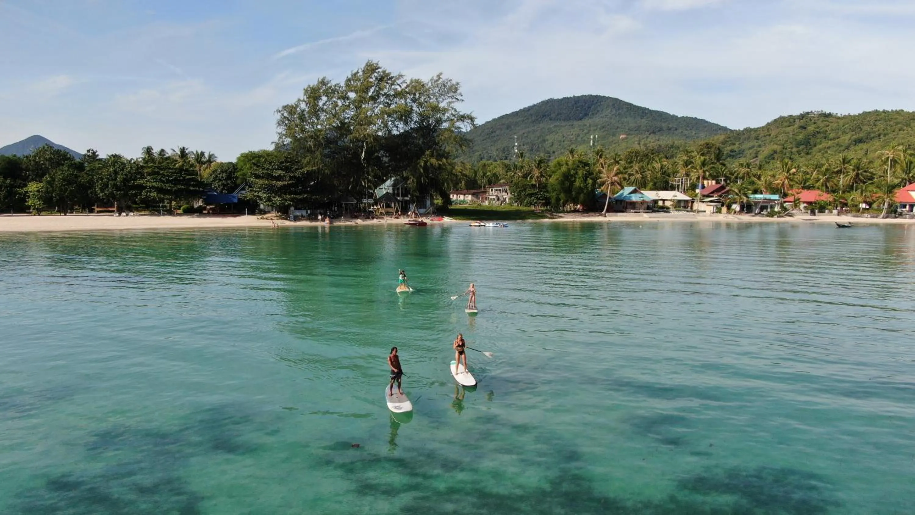 People in Tiki Beach Koh Phangan Beach Restaurant Bar and Coworking