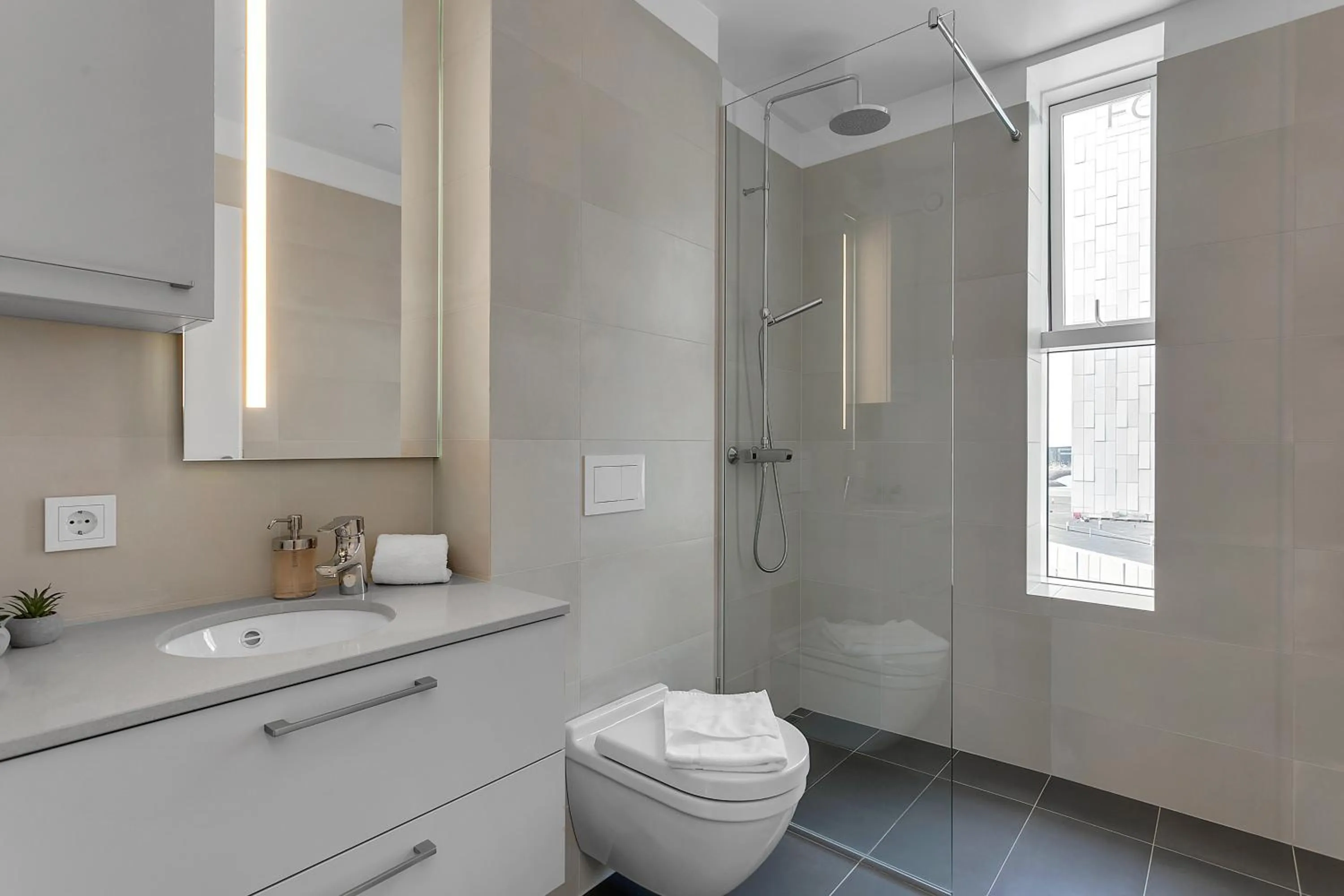 Shower in Sif Apartments by Heimaleiga