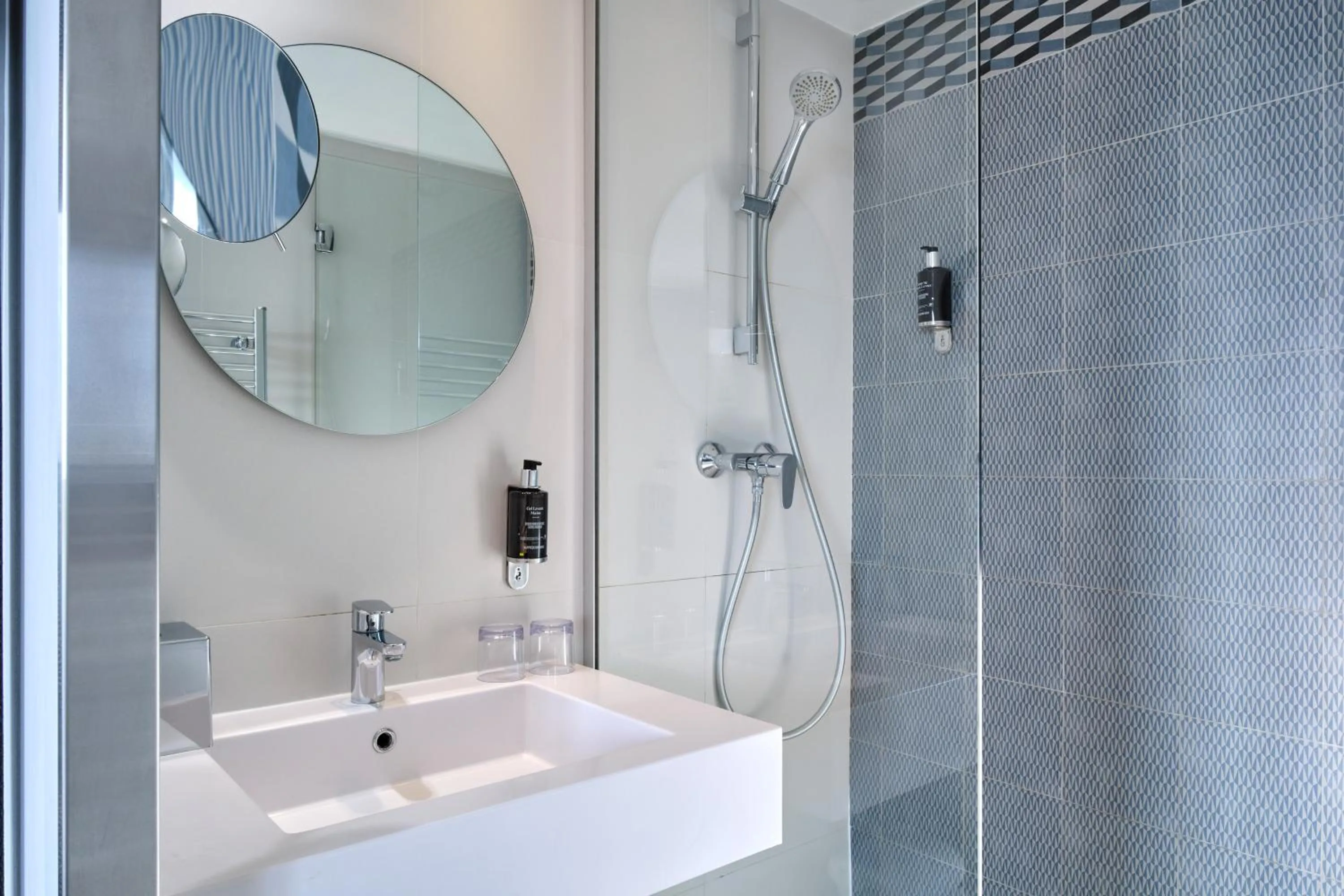 Shower in Hotel Atrium by Happyculture