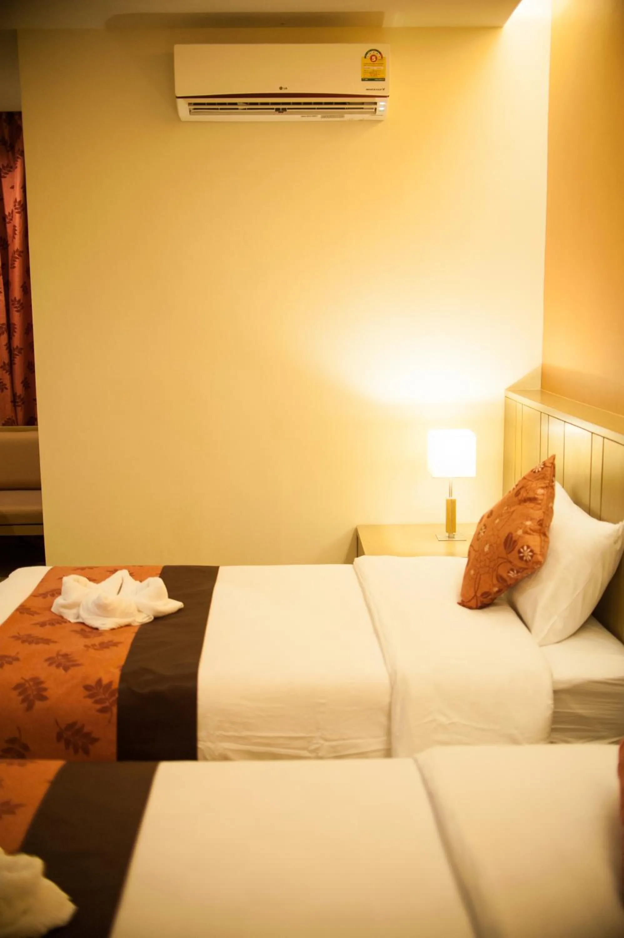 Bed in Panya Resort Hotel