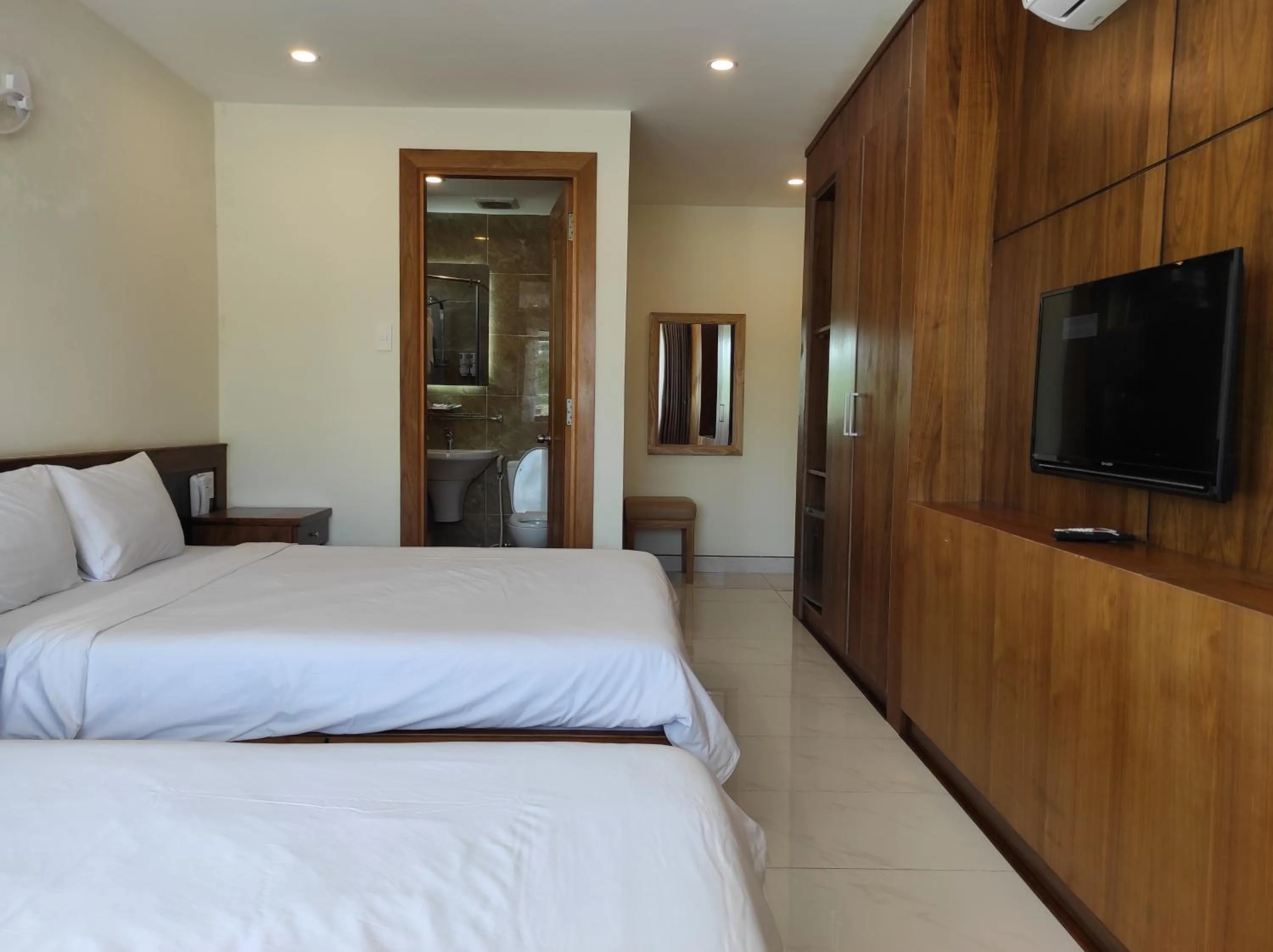 Photo of the whole room, Bed in HỒNG HẢI 2 HOTEL