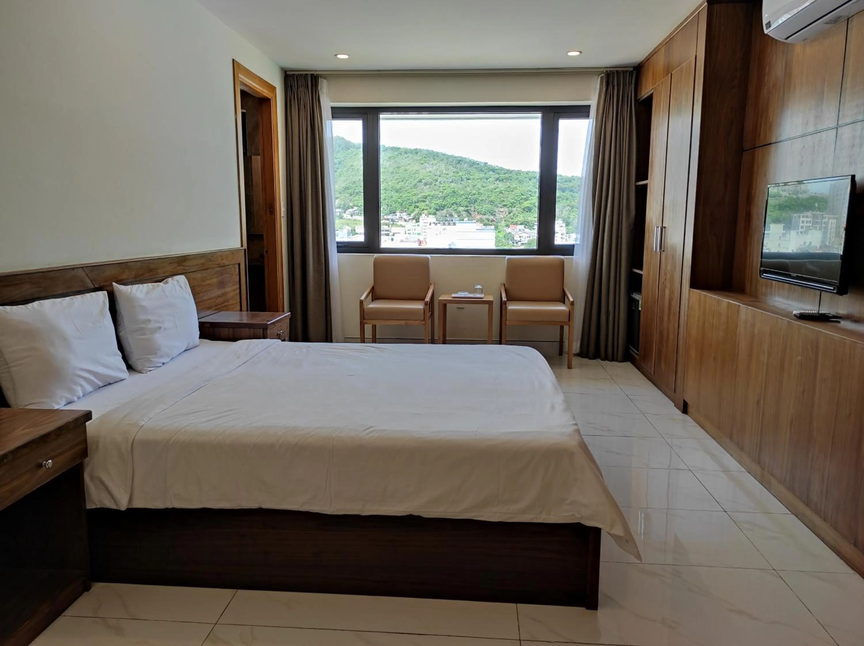 Photo of the whole room, Bed in HỒNG HẢI 2 HOTEL
