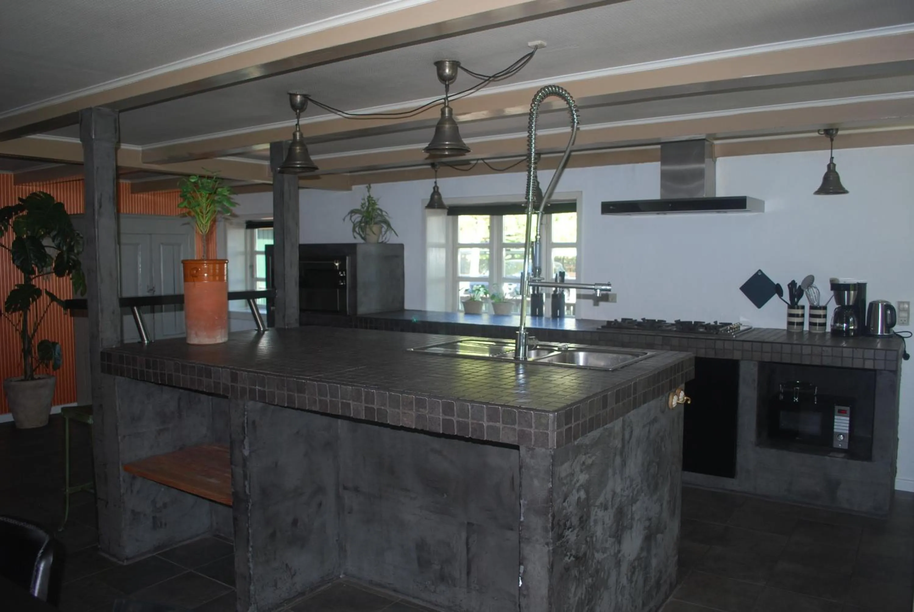 Kitchen or kitchenette in Adventure Park Apartments