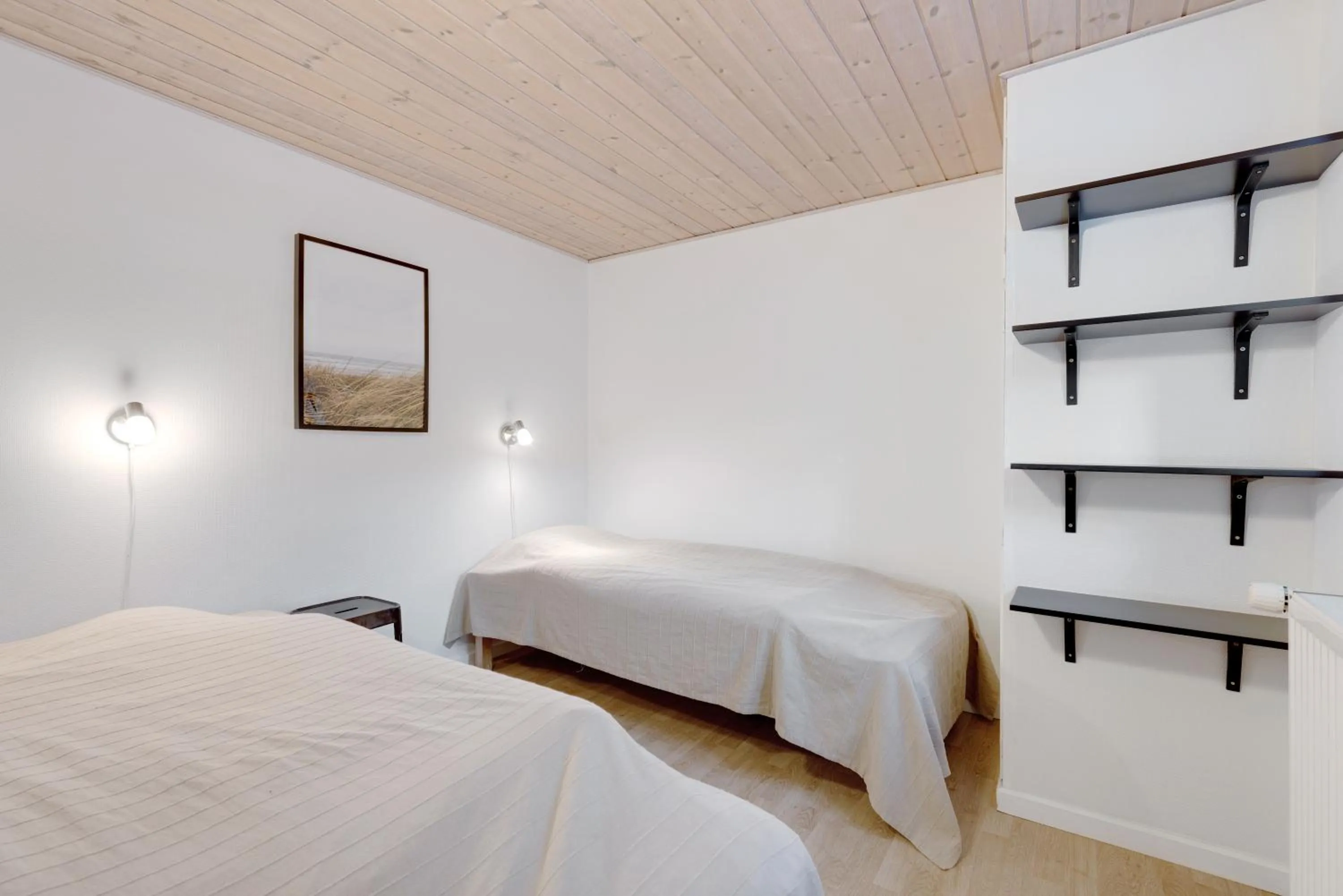 Bed in Adventure Park Apartments