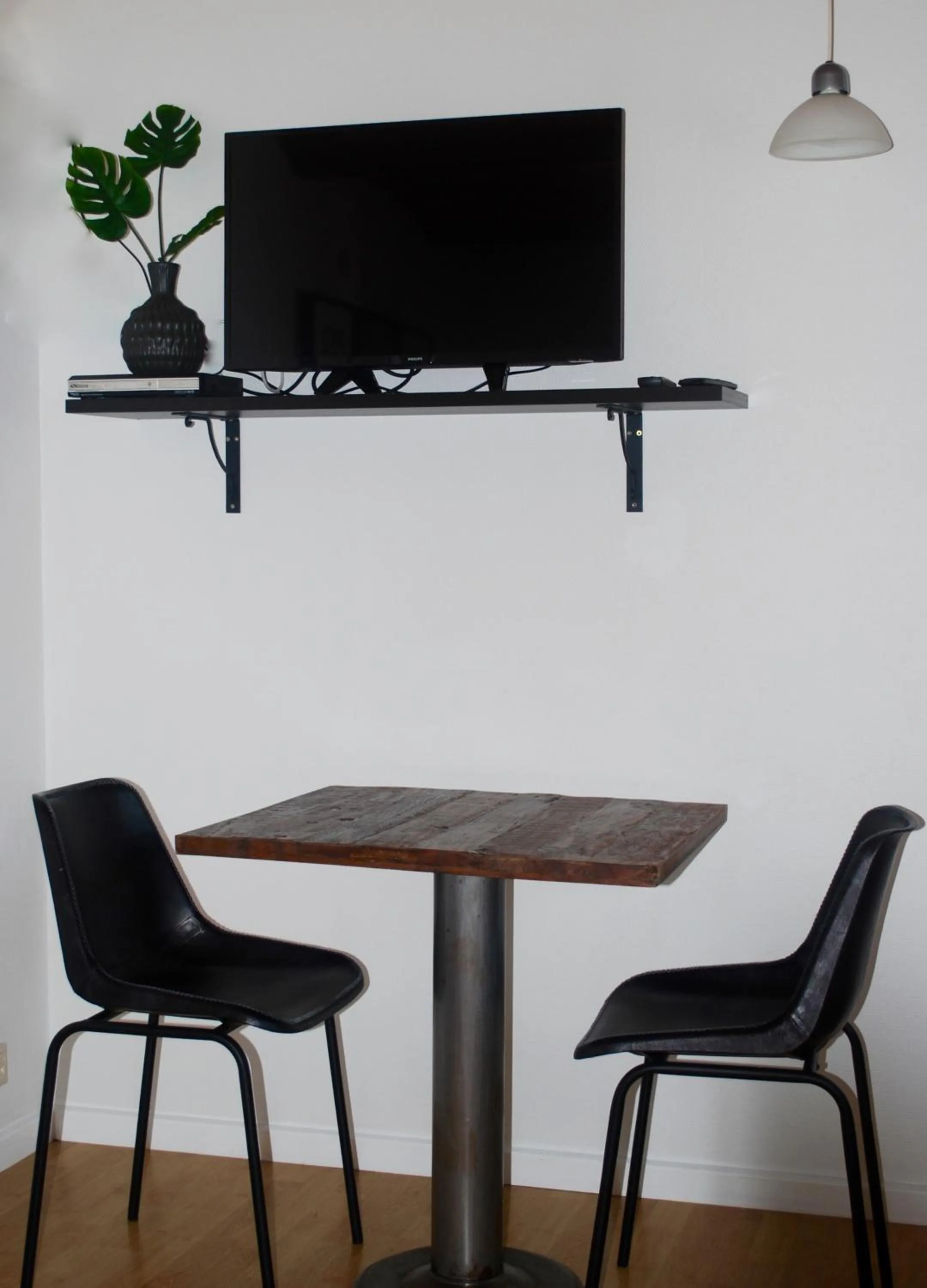 Dining area in Adventure Park Apartments