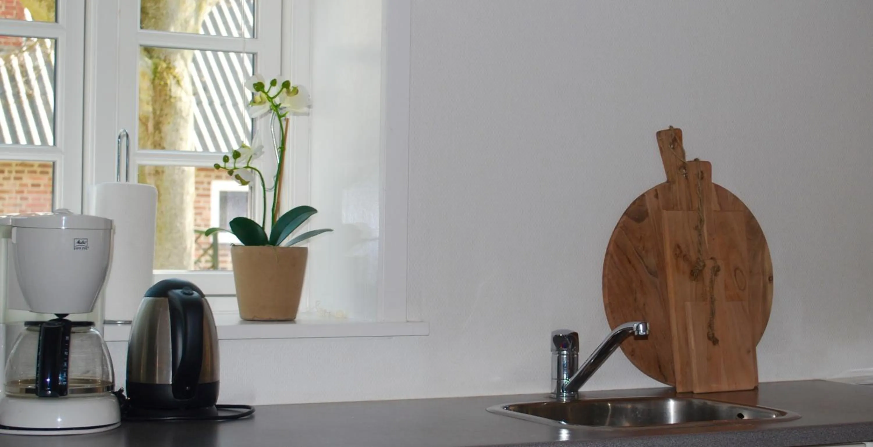 Kitchen or kitchenette in Adventure Park Apartments