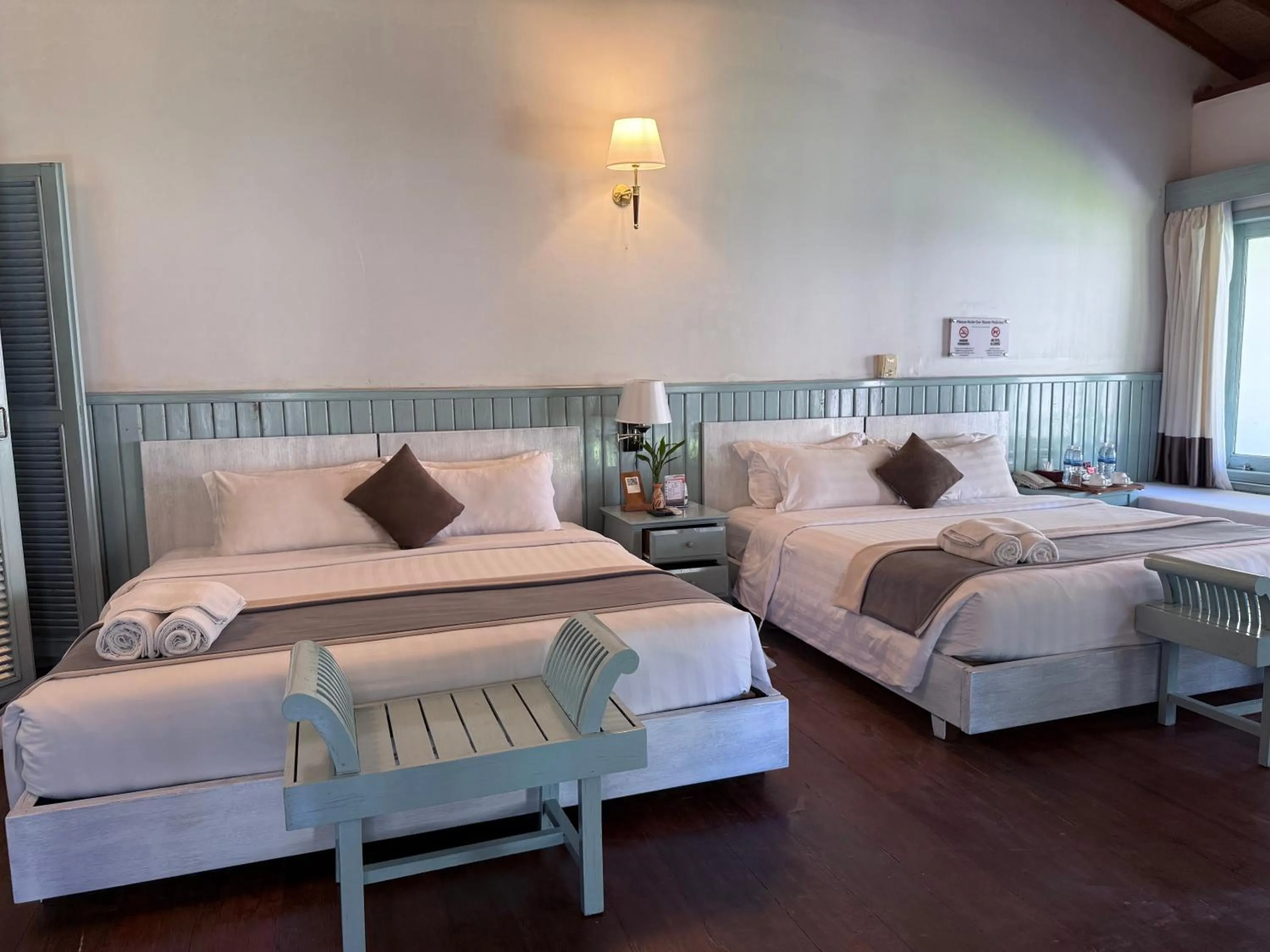 Bedroom, Bed in Nataya Round House Coral Bay Resort