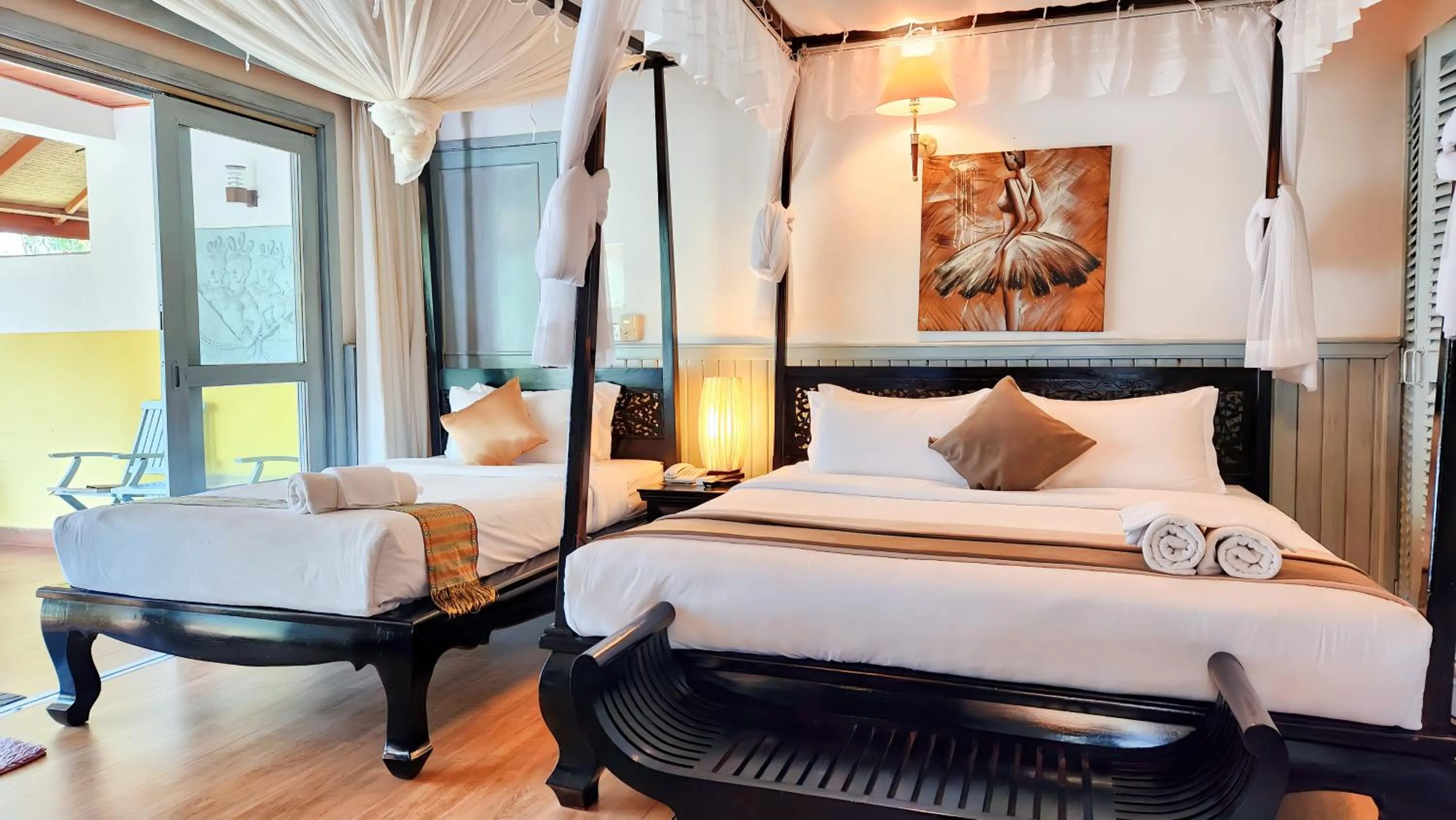 Bedroom, Bed in Nataya Round House Coral Bay Resort