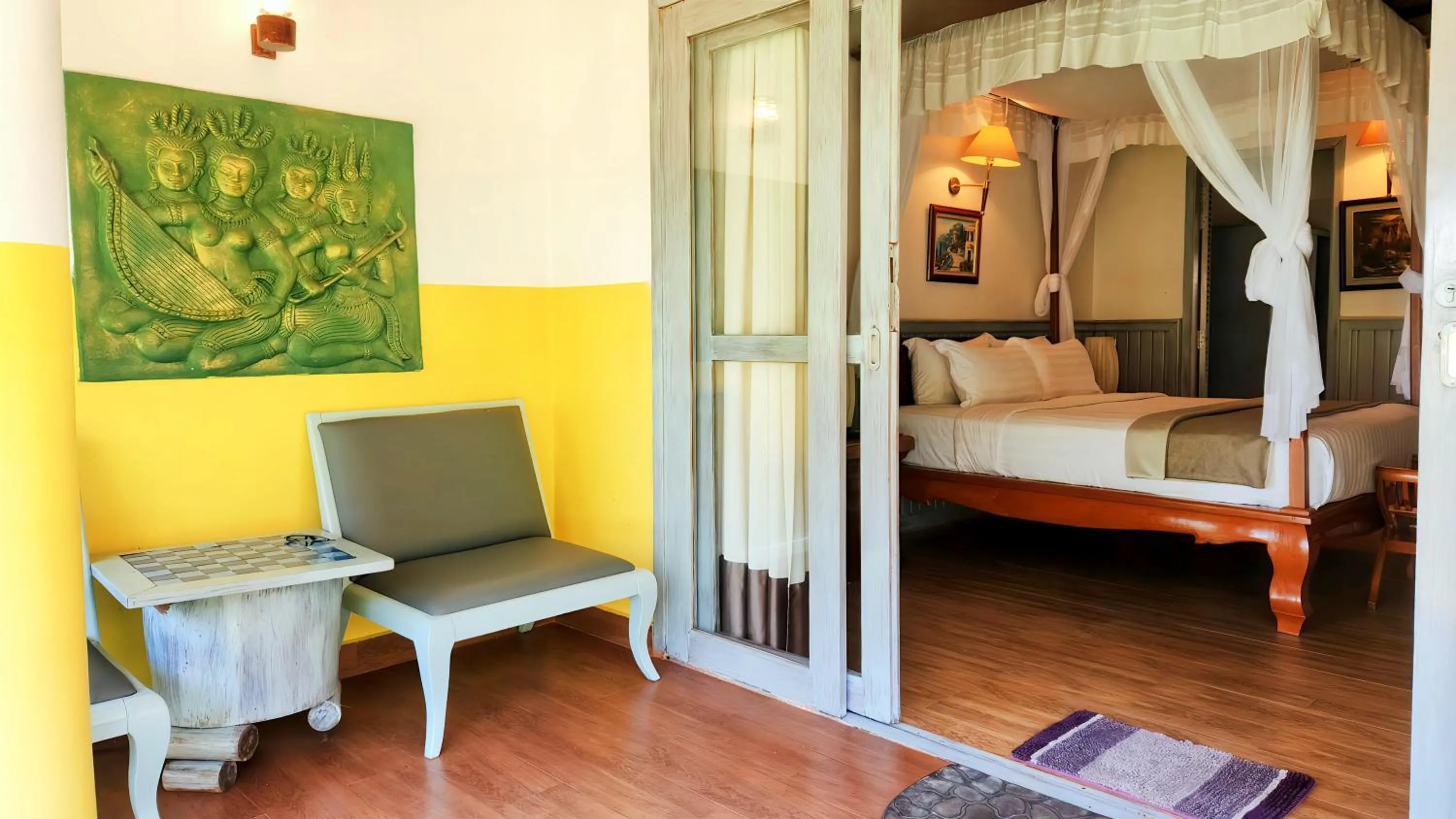 Balcony/Terrace, Bed in Nataya Round House Coral Bay Resort