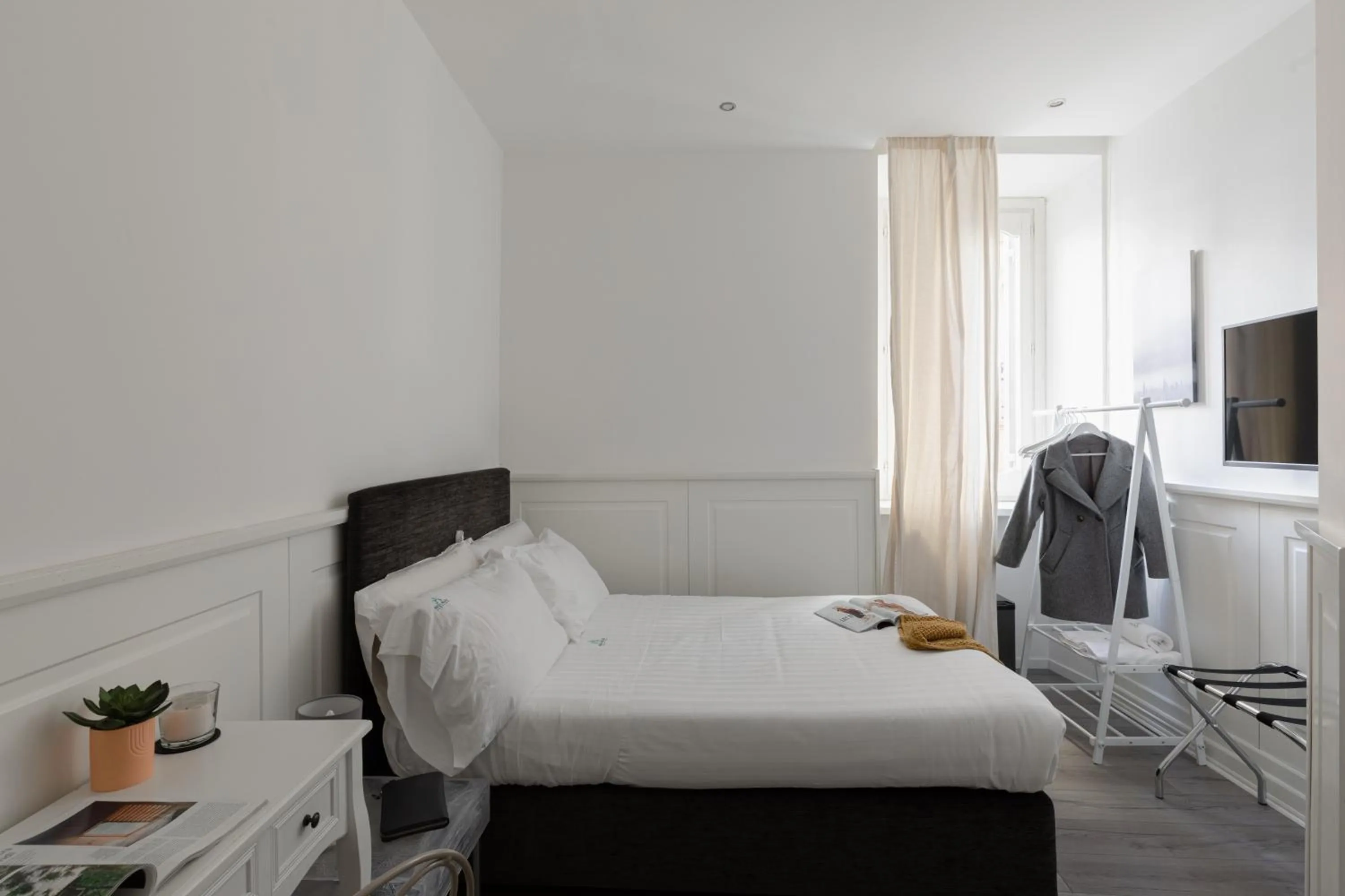 Bed in Relais Roma Centro