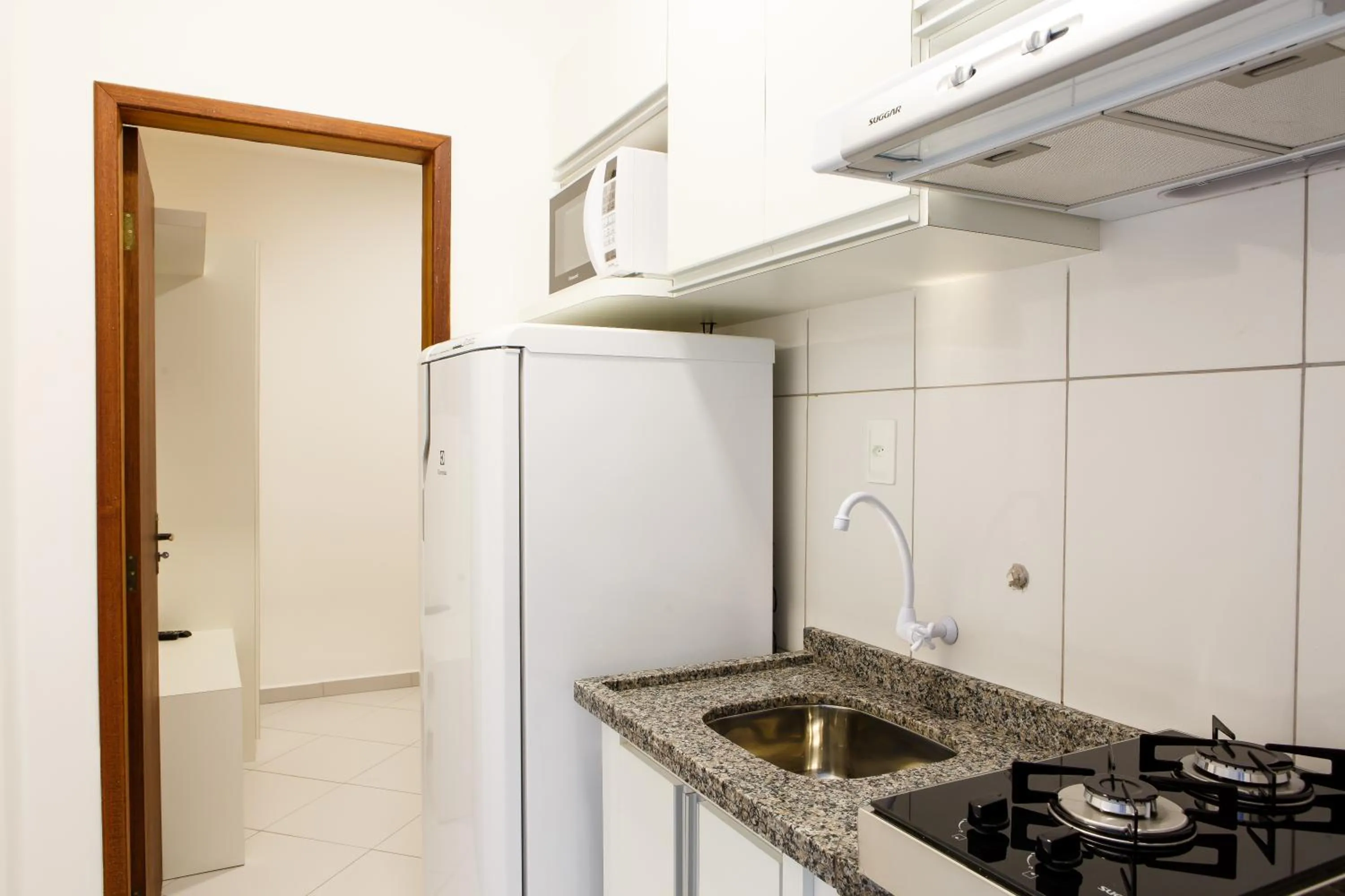 Kitchen or kitchenette in Dr. Marinho Apart Hotel
