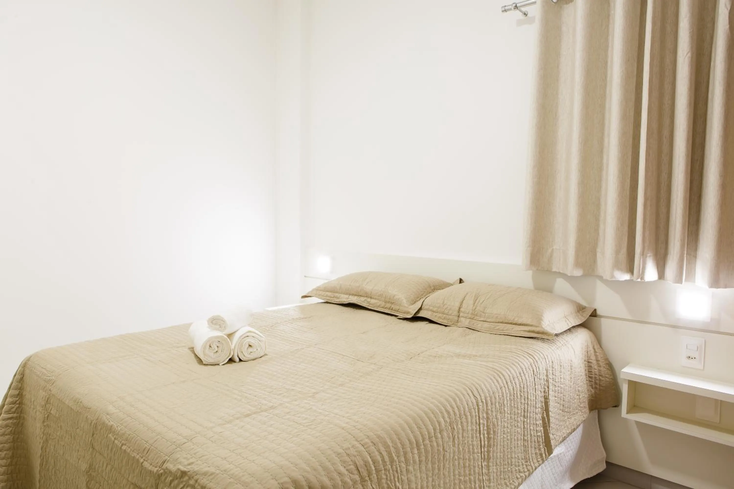 Bed in Dr. Marinho Apart Hotel