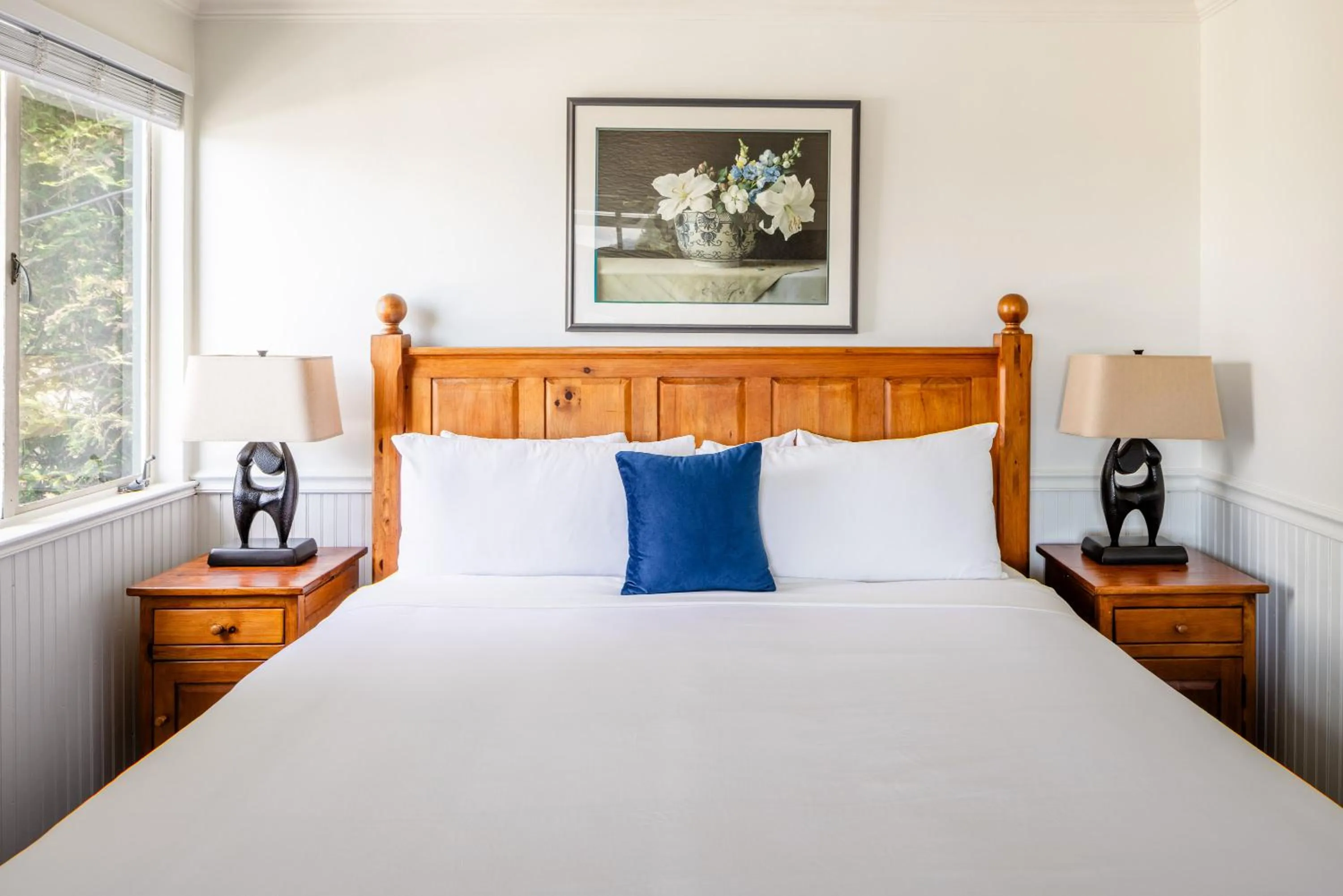 Bed in Carmel Fireplace Inn