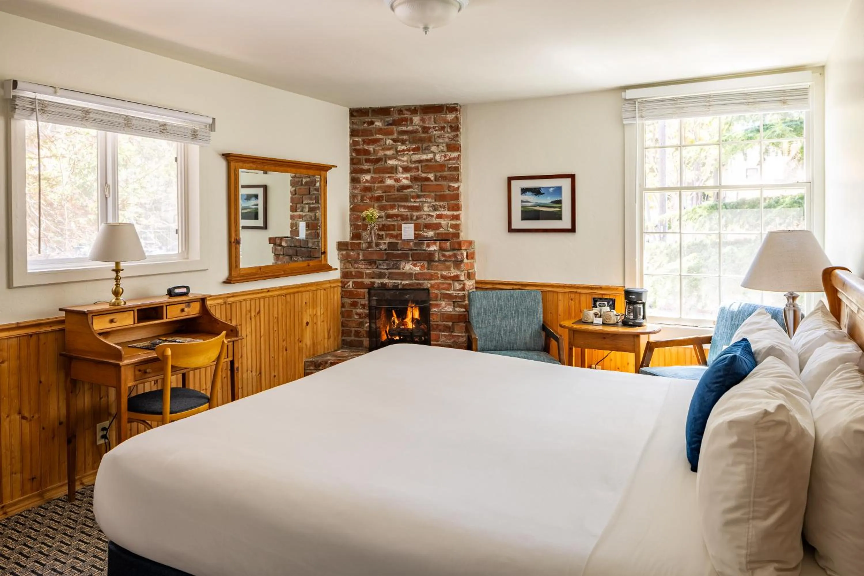 Bed in Carmel Fireplace Inn