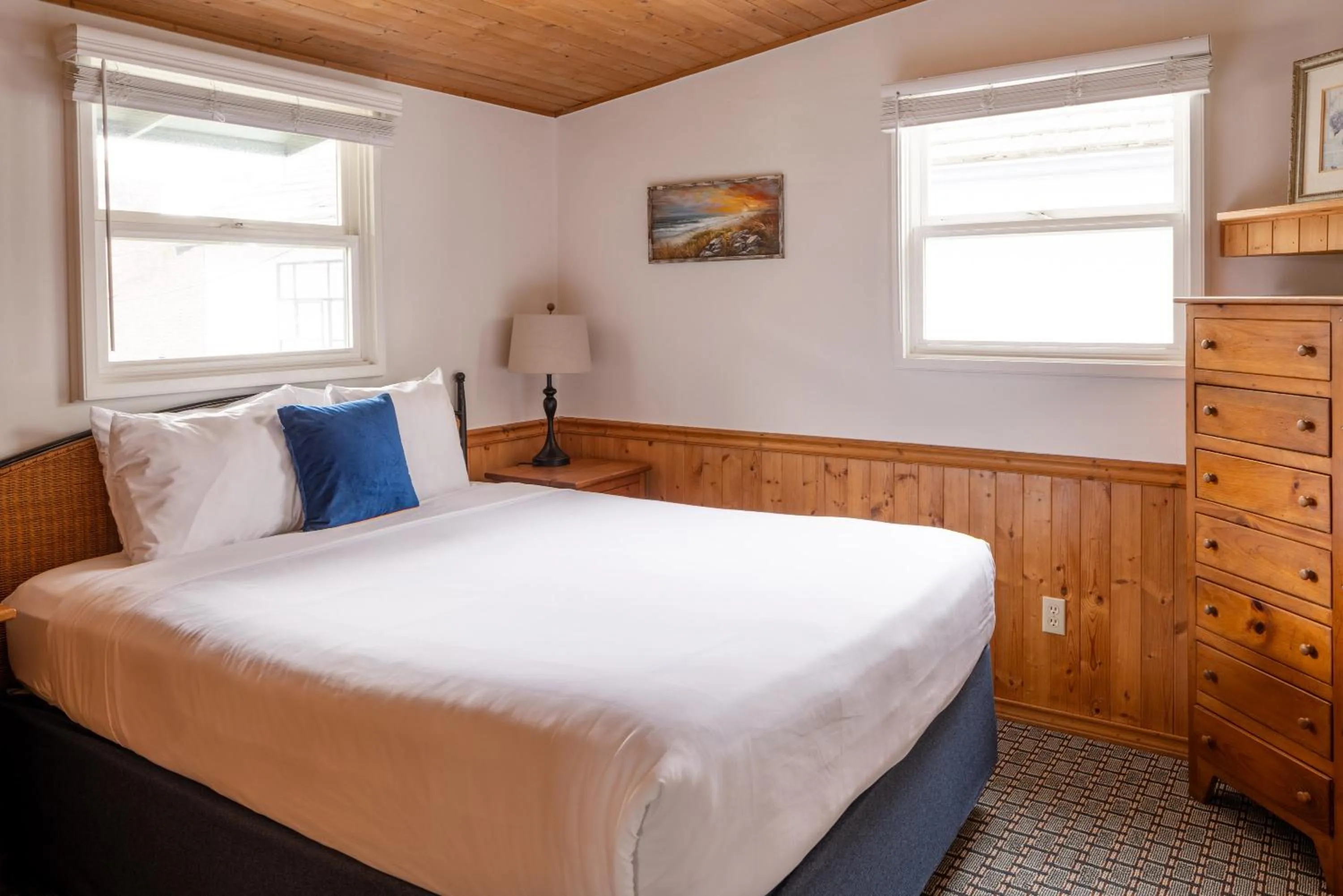 Bed in Carmel Fireplace Inn