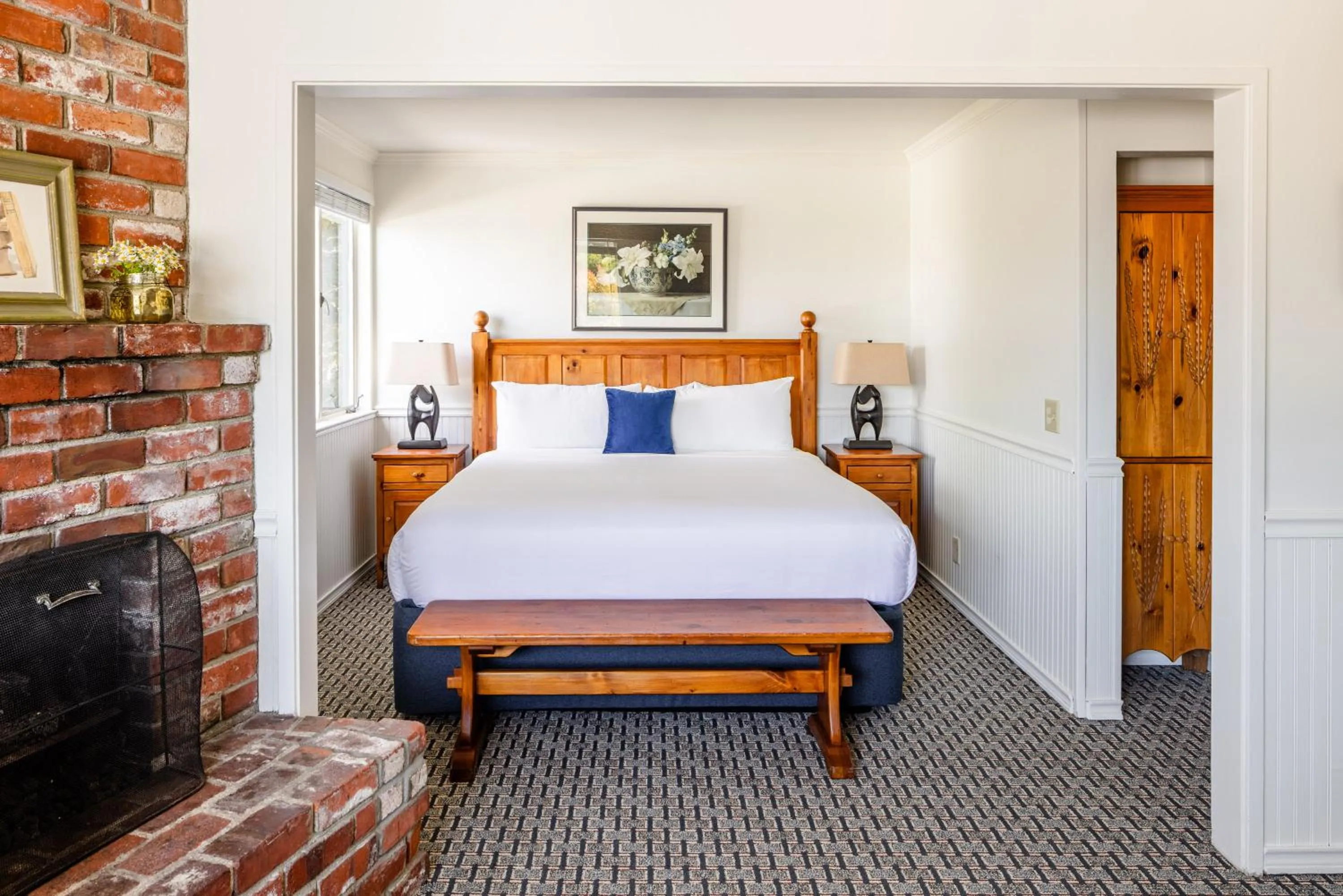 Bed in Carmel Fireplace Inn