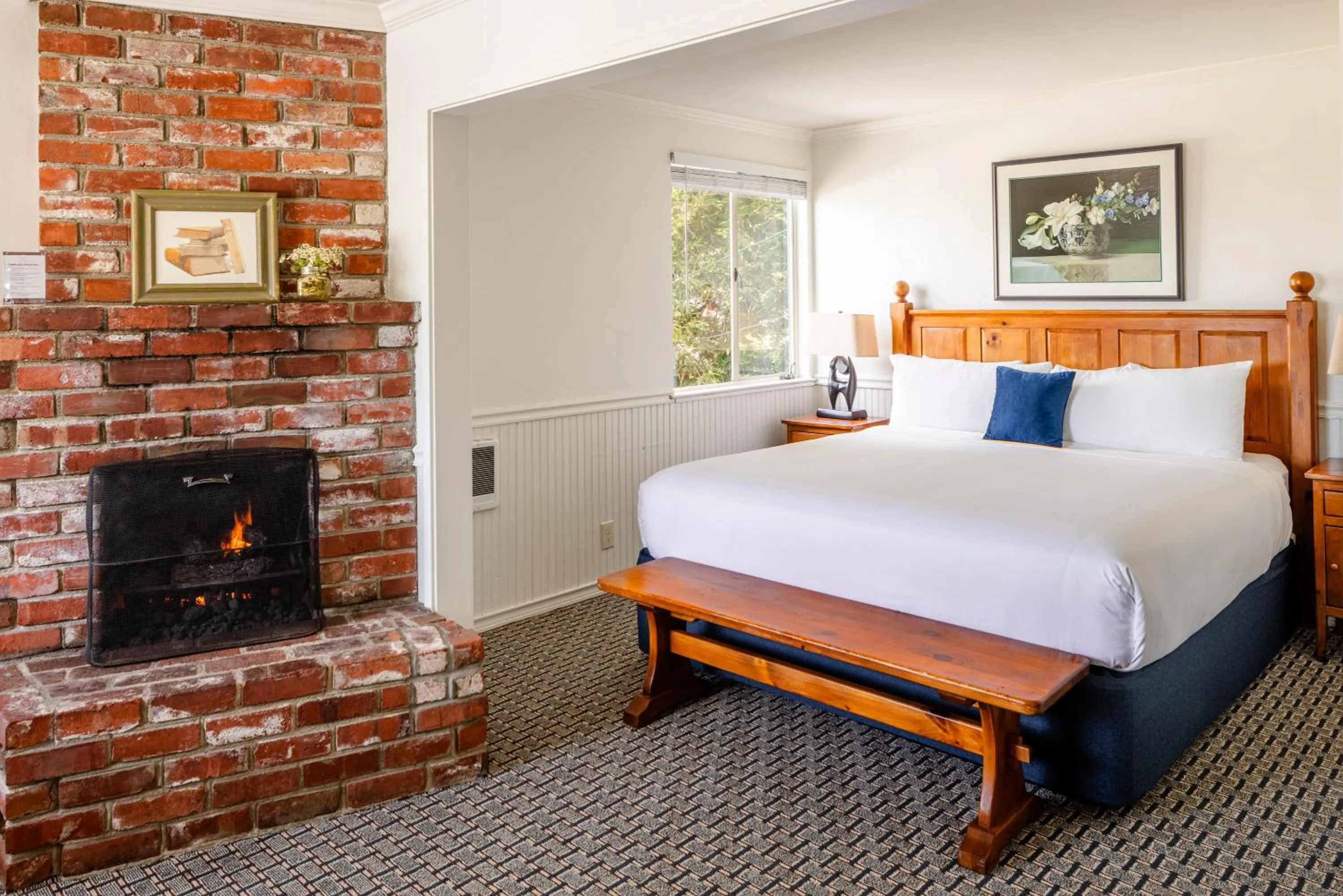 Bed in Carmel Fireplace Inn