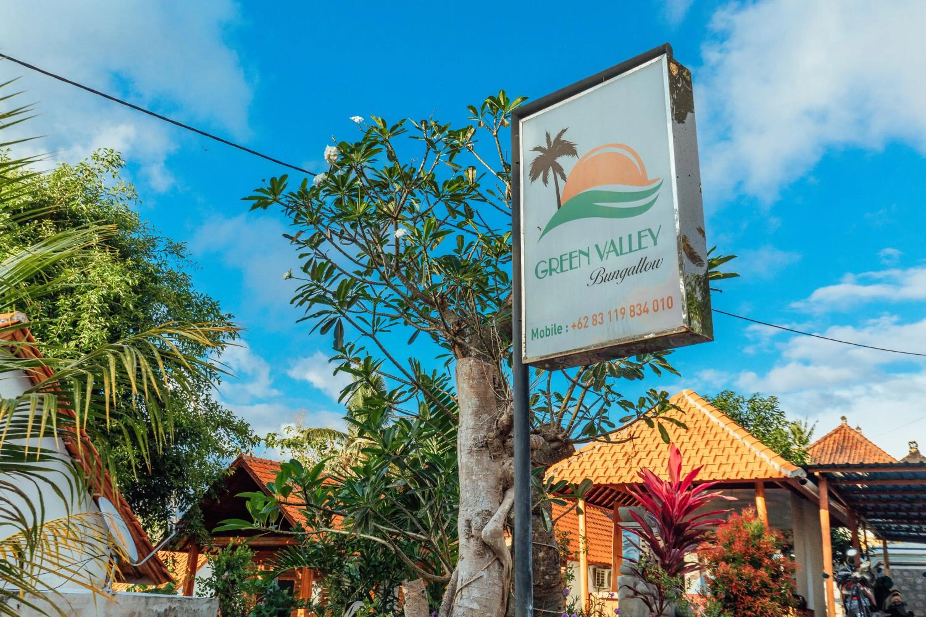 Property logo or sign in Green Valley Bungalow