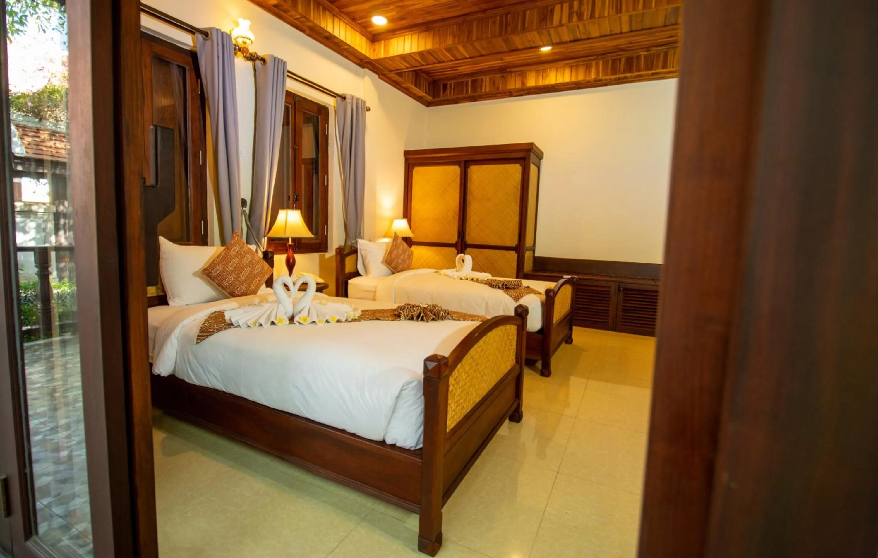 Bedroom, Bed in Treasure Hotel Laos