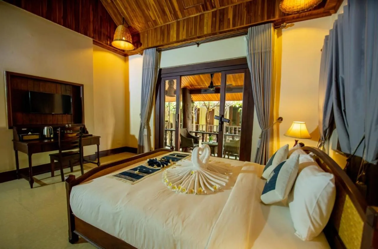 Bed in Treasure Hotel Laos