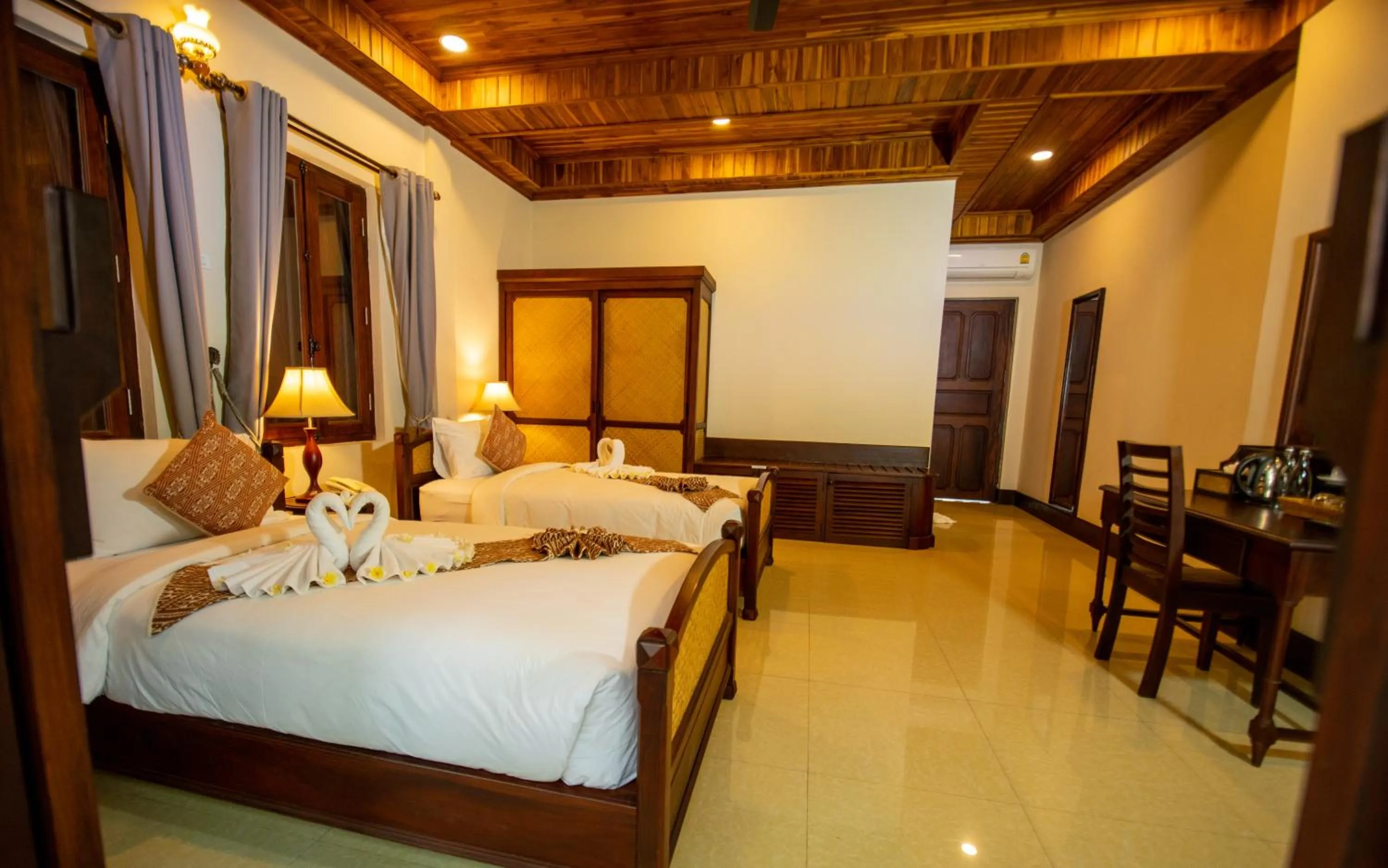 Bedroom, Bed in Treasure Hotel Laos