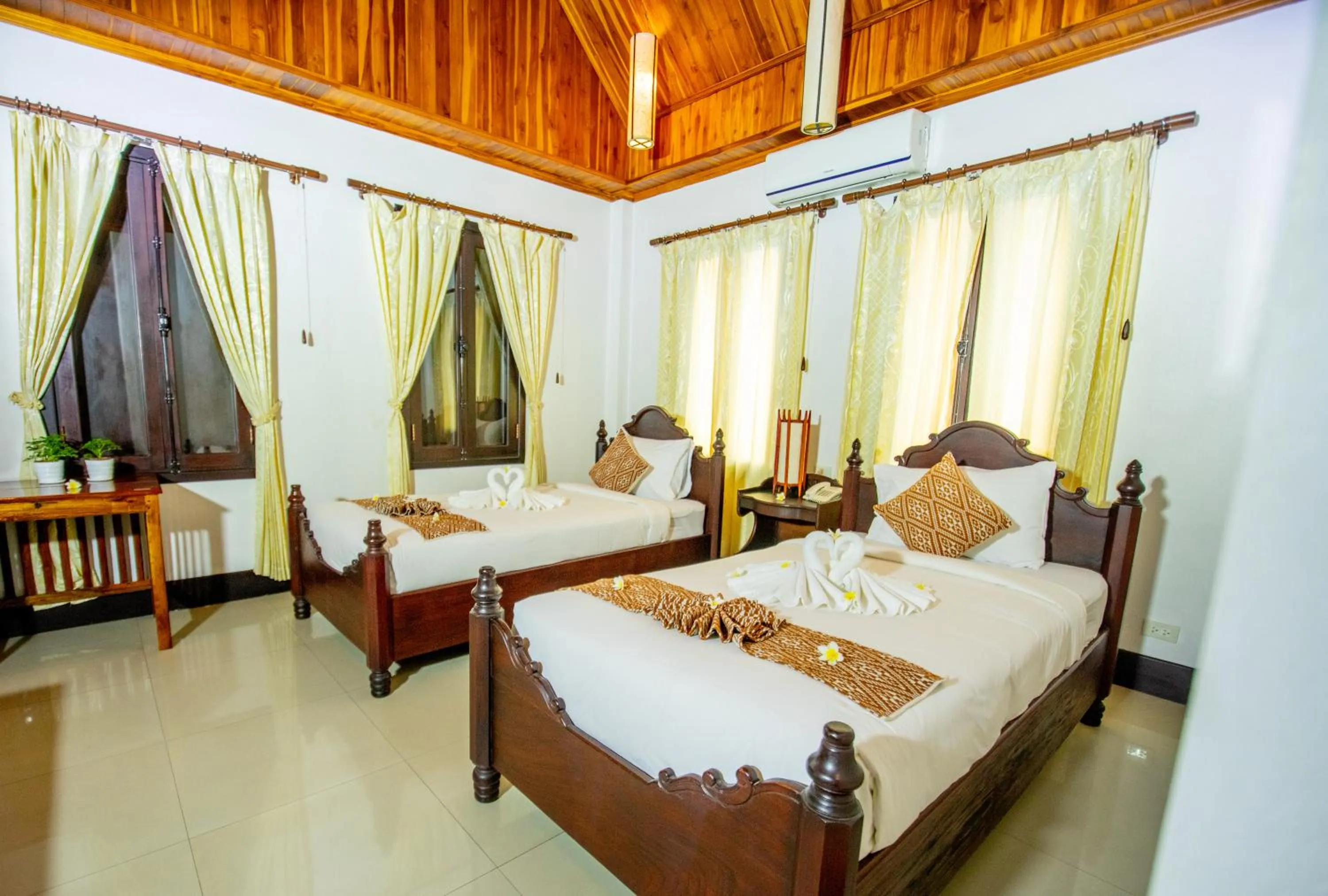 Bedroom, Bed in Treasure Hotel Laos
