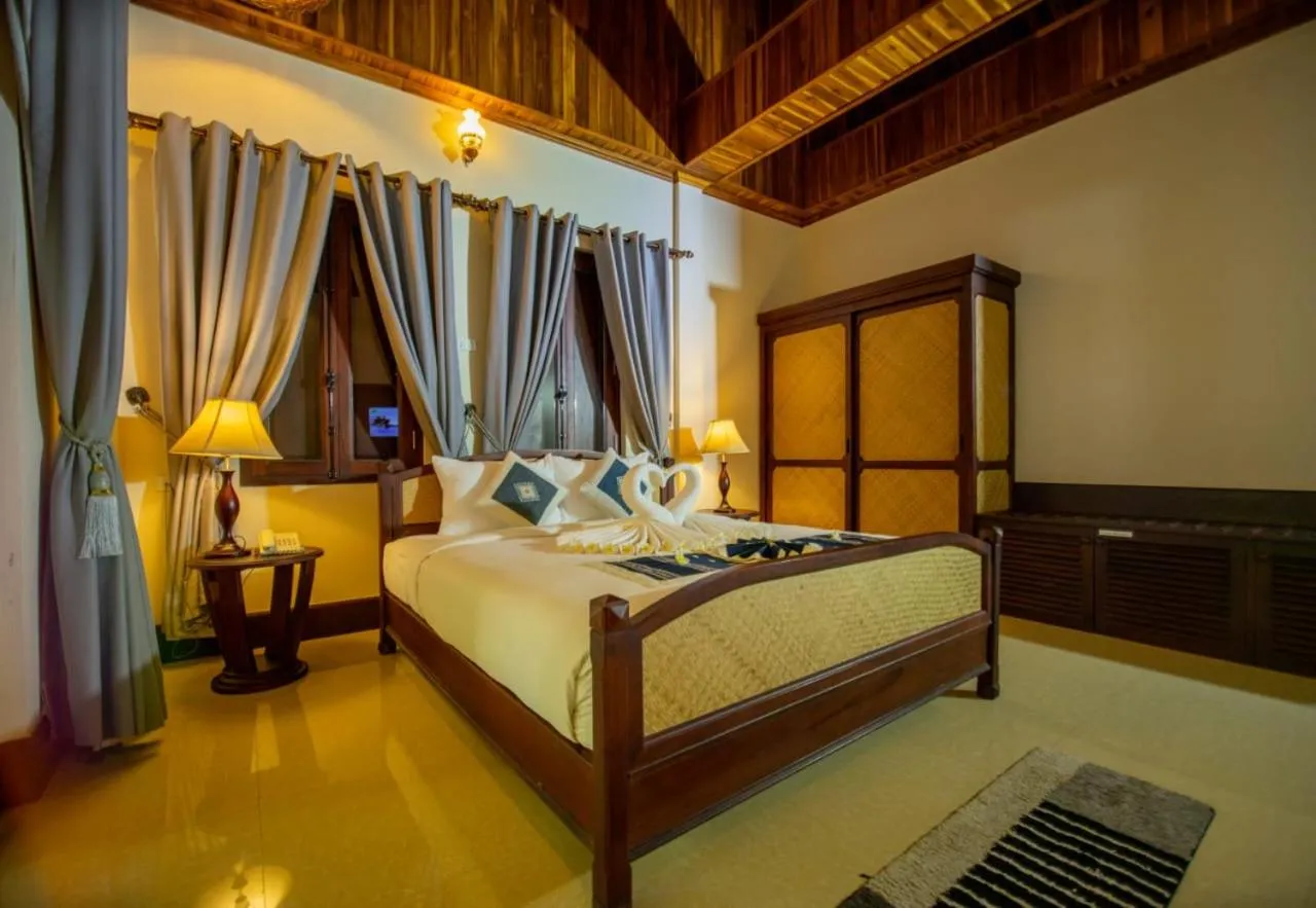 Bed in Treasure Hotel Laos