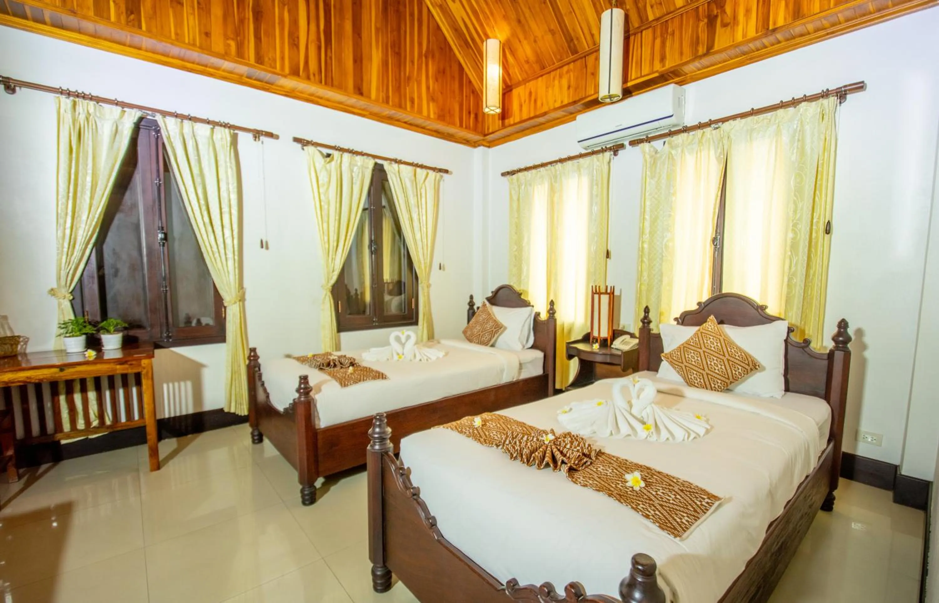 Bedroom, Bed in Treasure Hotel Laos