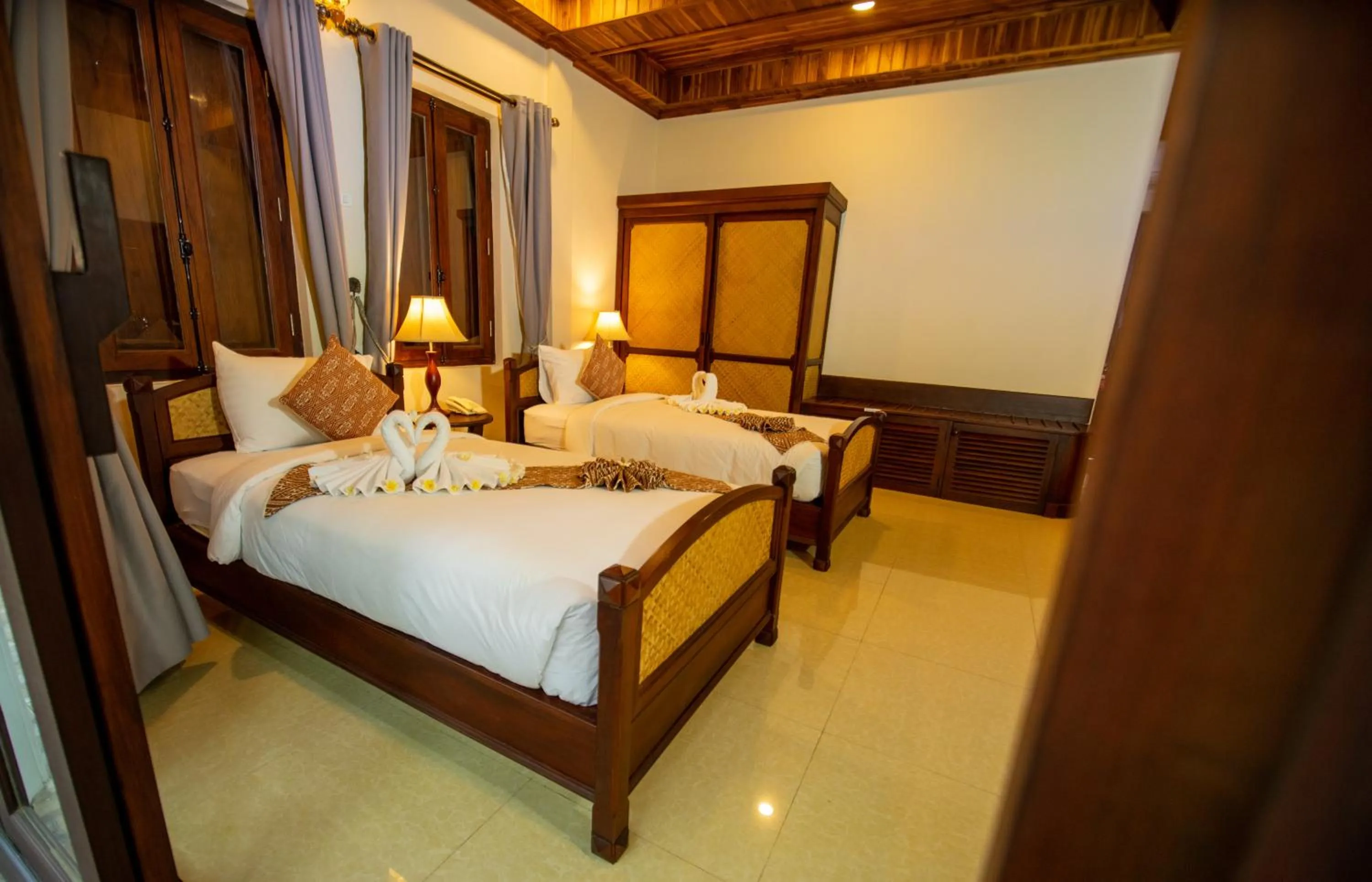 Bedroom, Bed in Treasure Hotel Laos