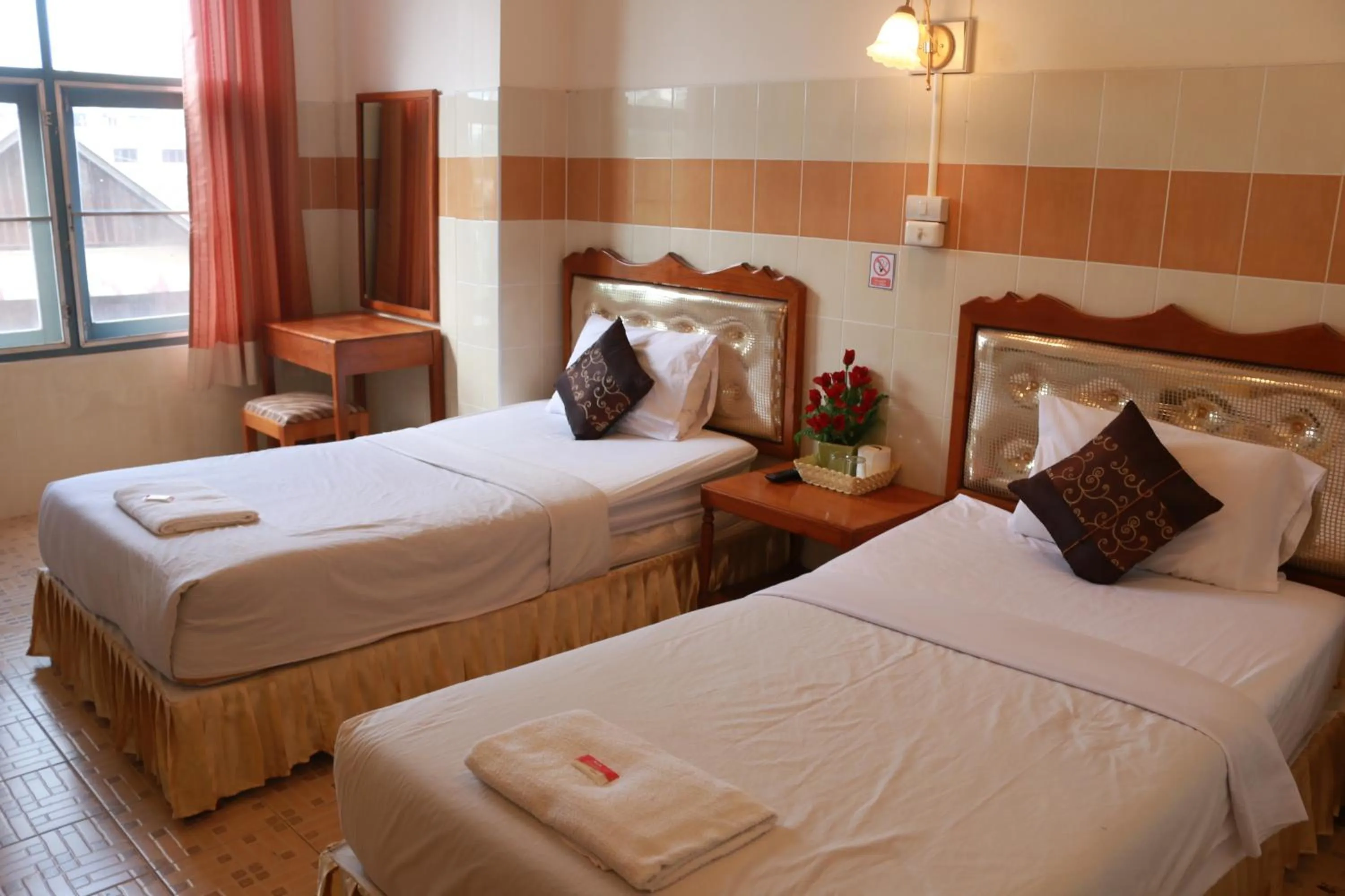 Bed in Mitaree Hotel 1