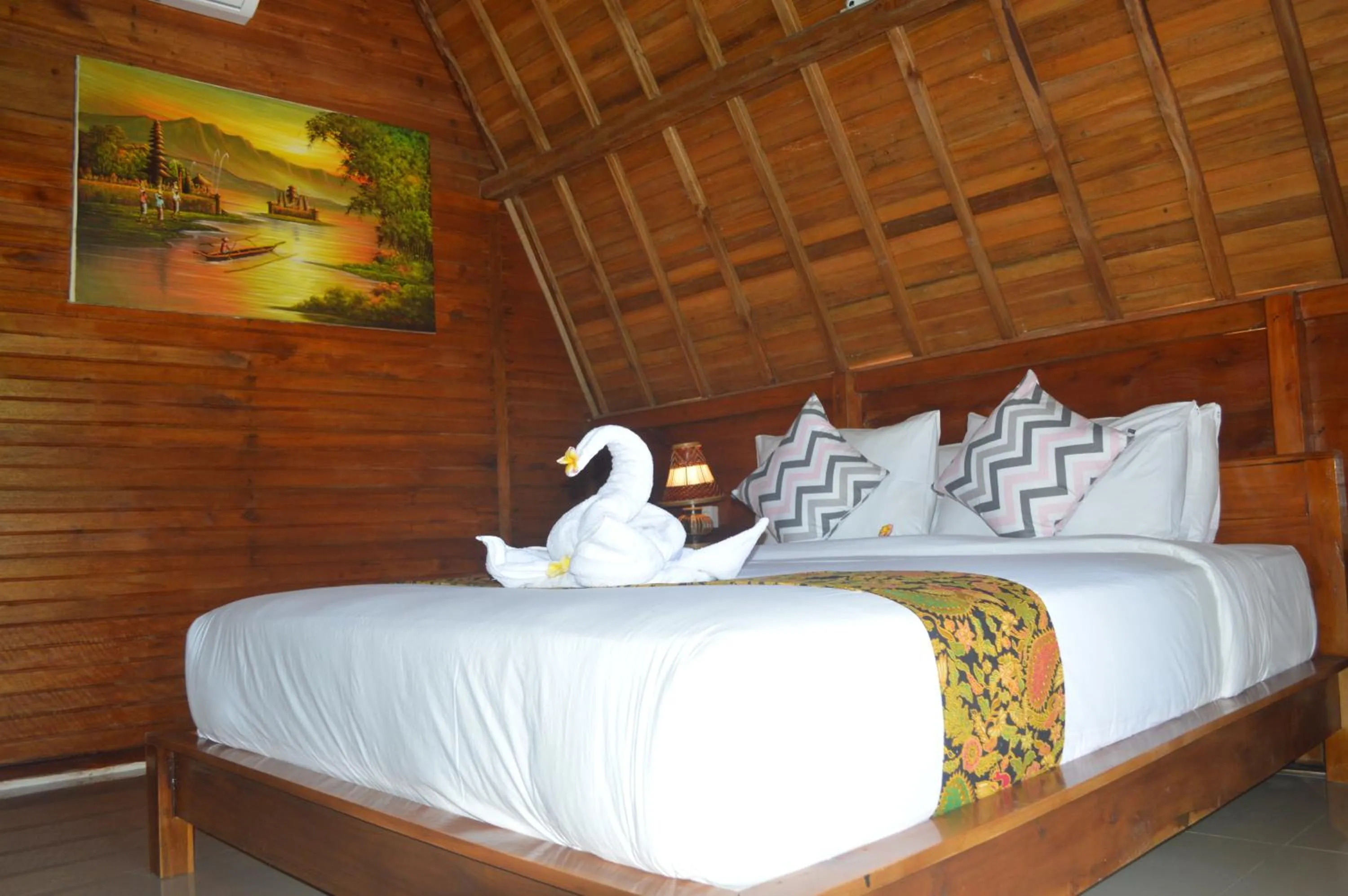Bed in Nyuh Gading Bungalow Nusa Penida