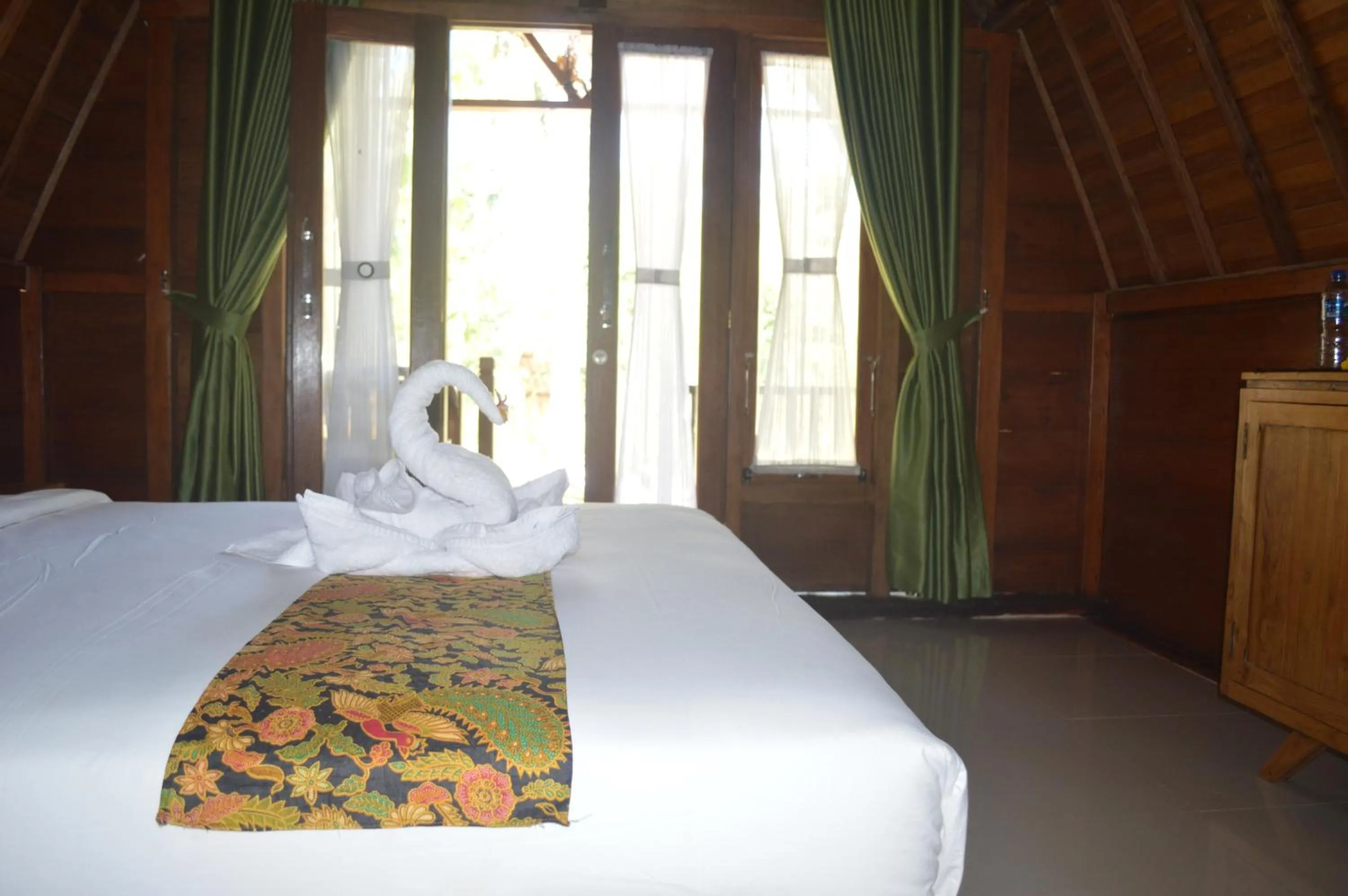 Bed in Nyuh Gading Bungalow Nusa Penida