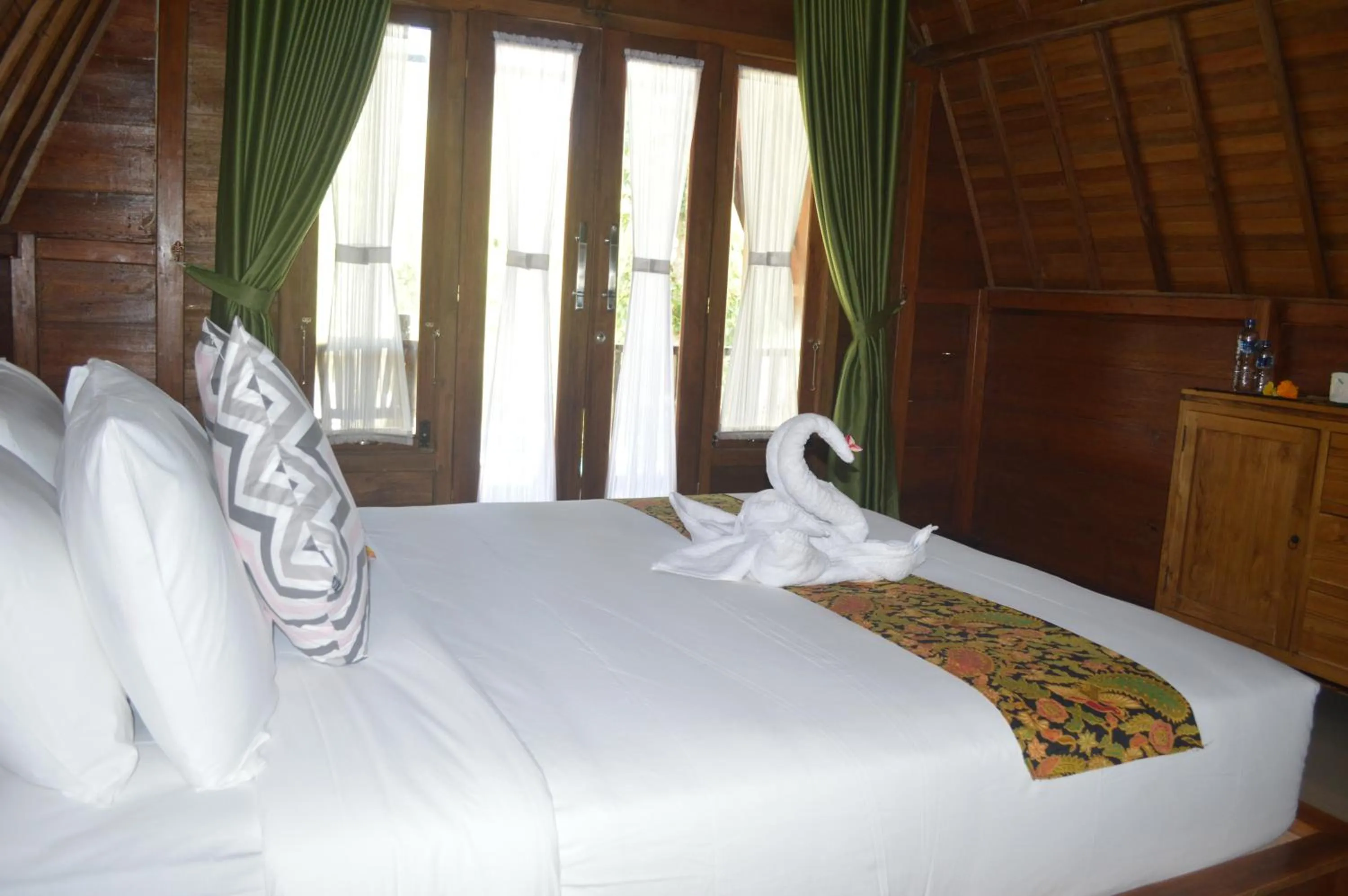 Bed in Nyuh Gading Bungalow Nusa Penida