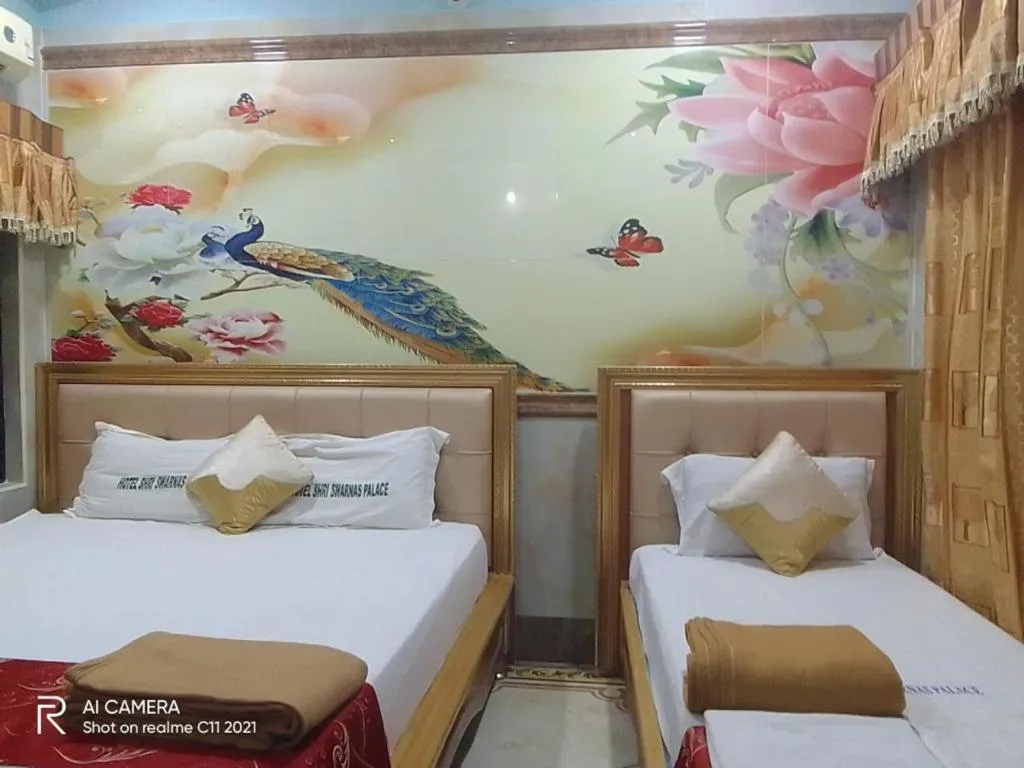 Bed in Hotel Shri Swarna's Palace - A Business Class Hotel