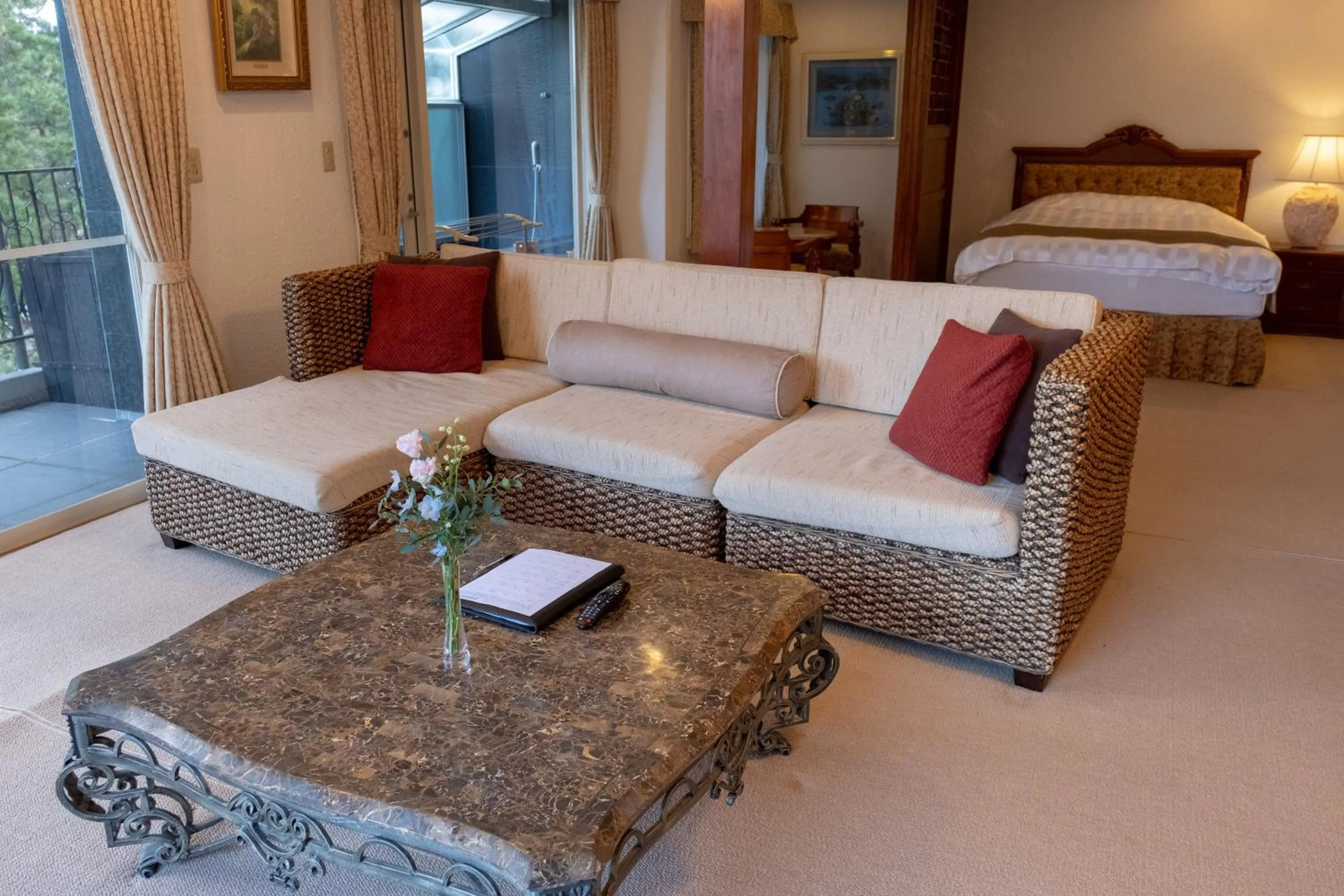 Living room, Bed in ISANA Resort