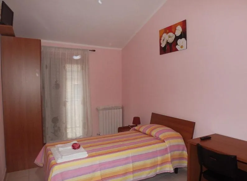 Photo of the whole room, Bed in Affittacamere Pone