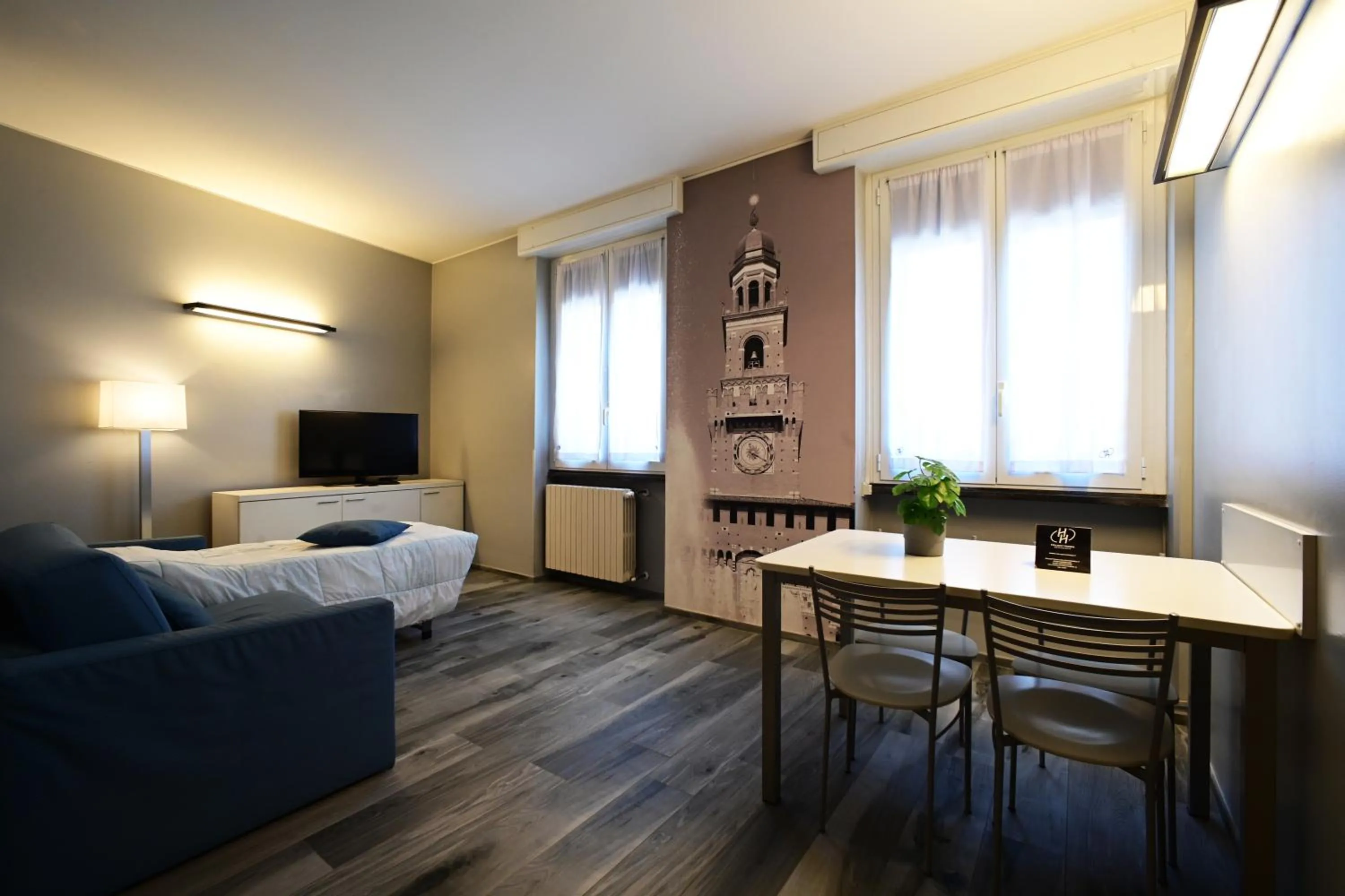 Living room, Bed in Holiday Homes Aparthotel Milano