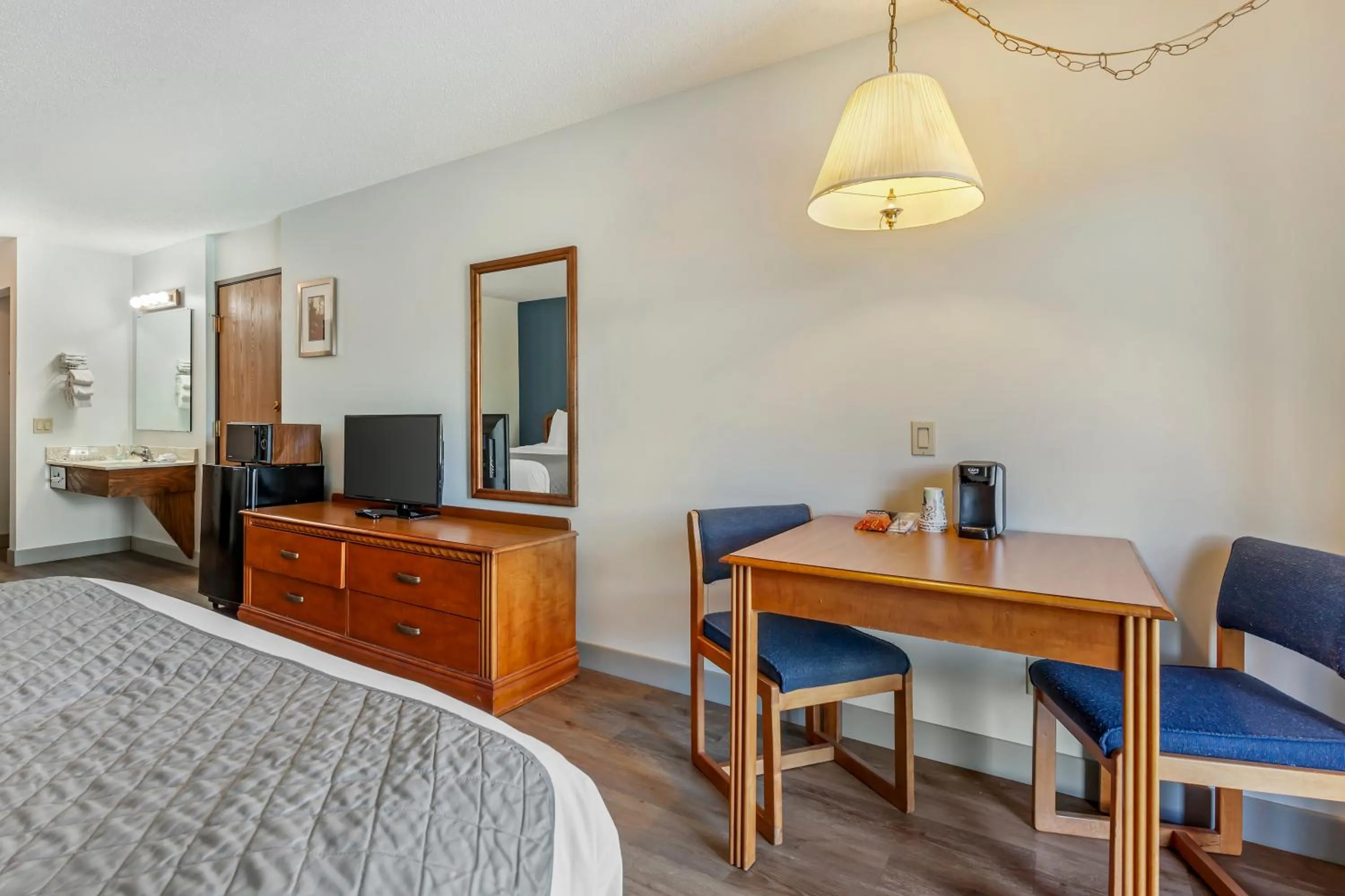 Bedroom in Polynesian Hotel & Suites