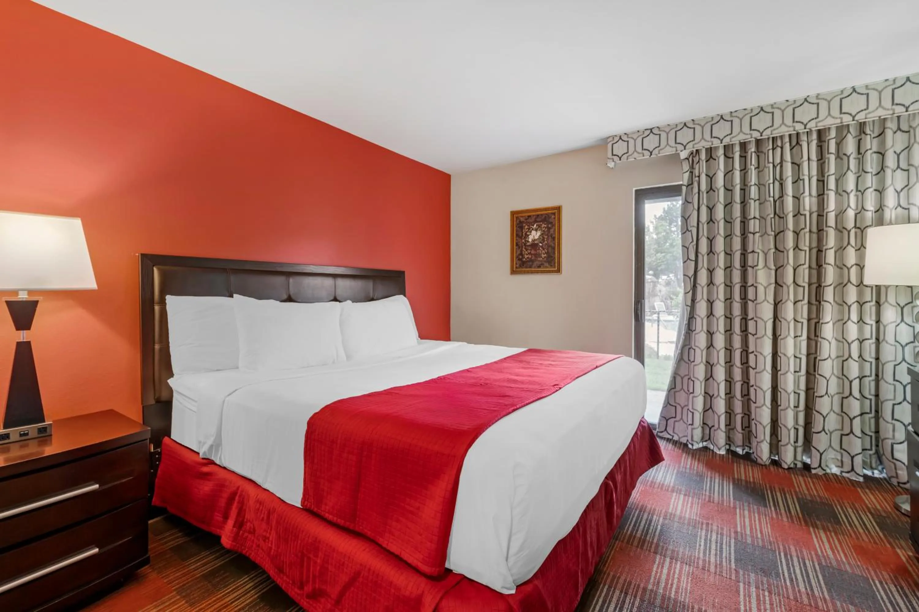 Bedroom in Polynesian Hotel & Suites