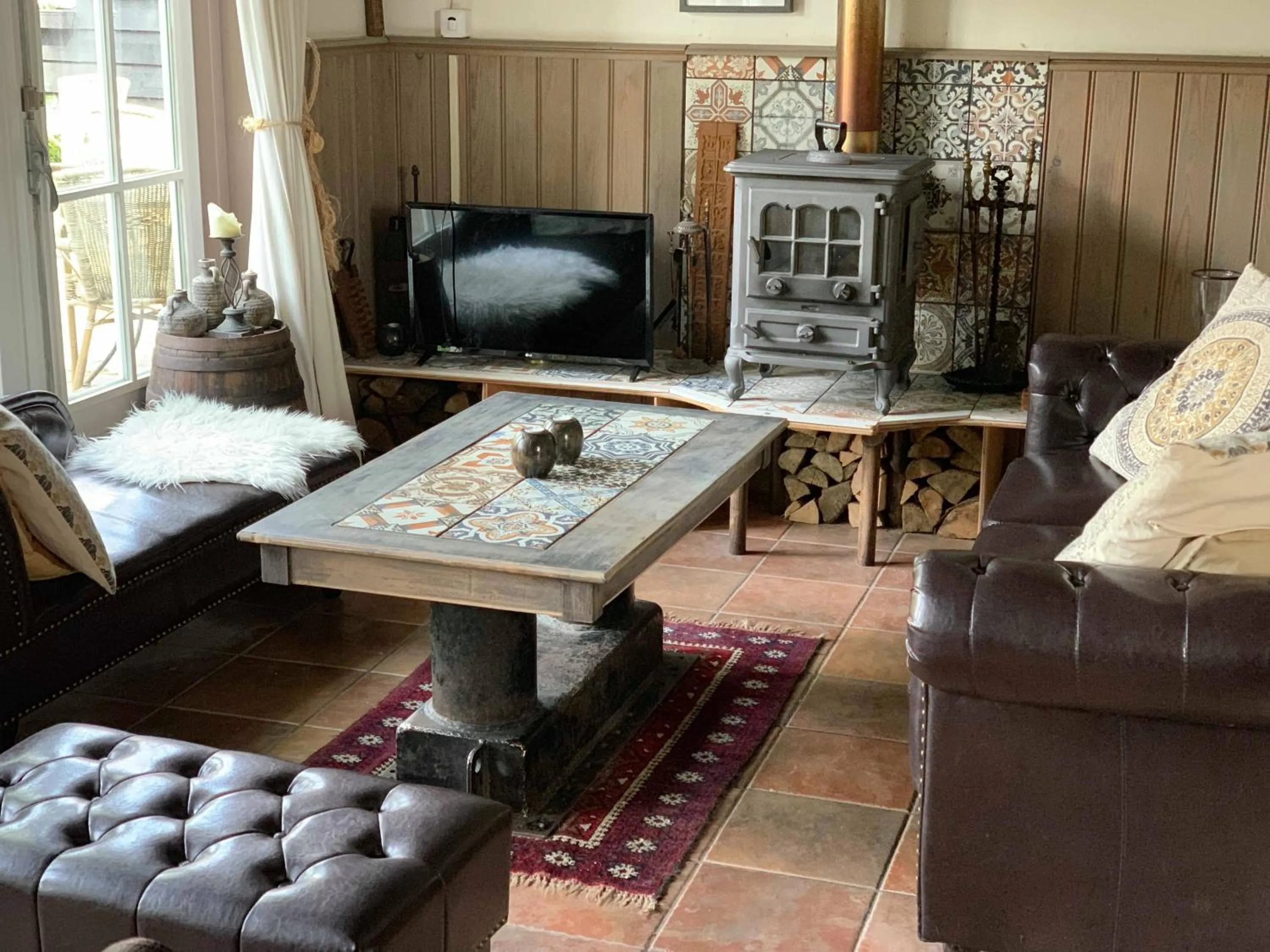 Communal lounge/ TV room in Brasserie de Peperboom