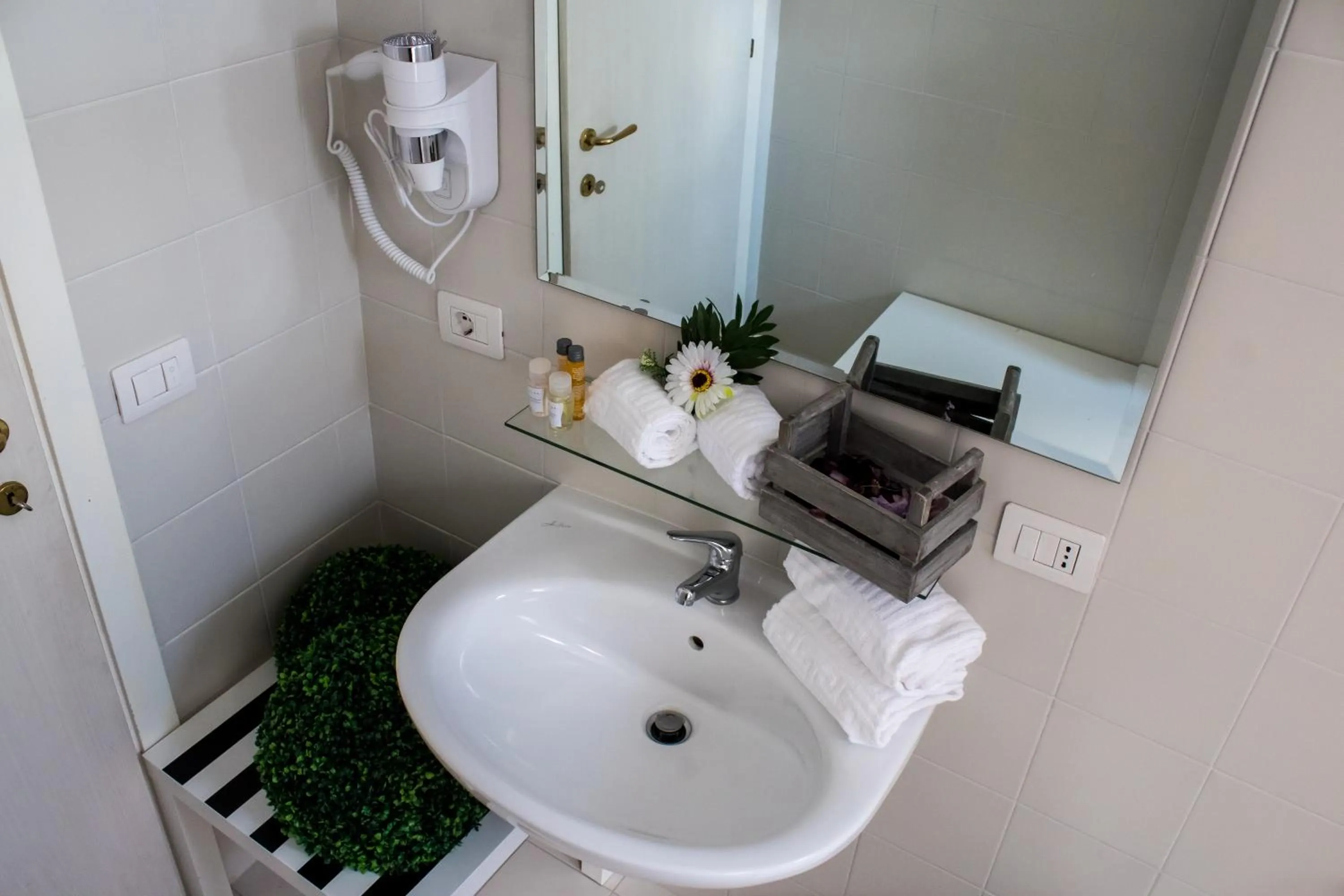 Bathroom in Coluni Sport & Resort srl