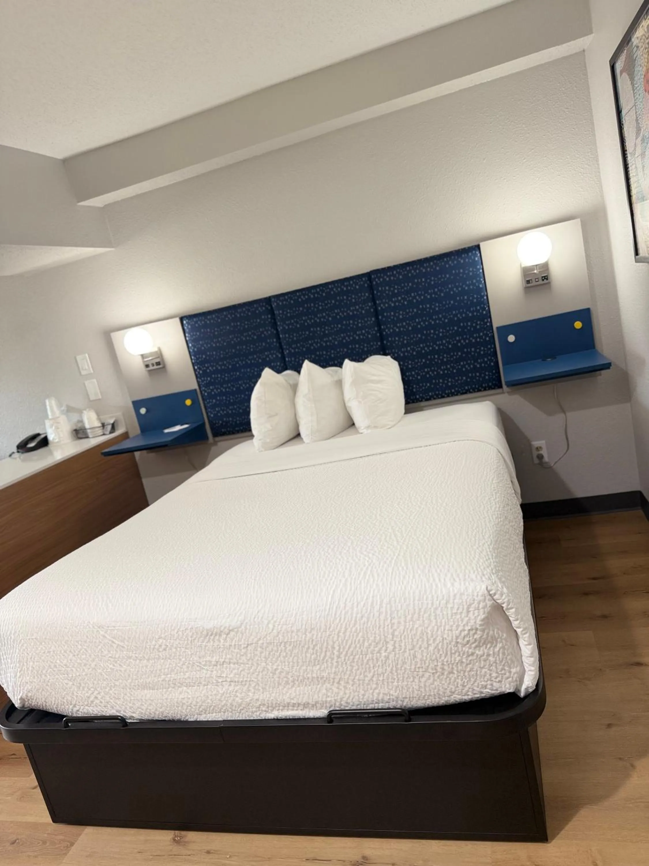 Bed in Microtel Inn & Suites by Wyndham Sioux Falls