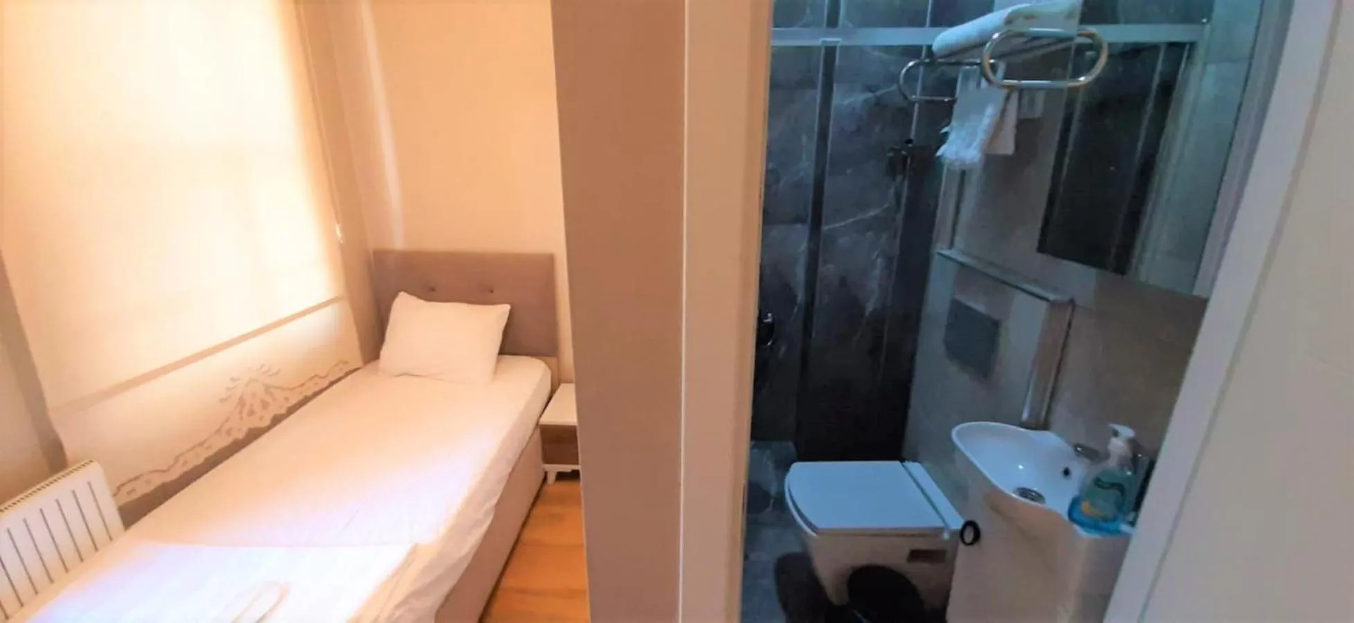 Bathroom, Bed in valide-maide hotel